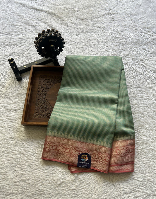 Viscose Georgette Saree Sea Green Colored Complemented with a peach Color Zari Border. - Sampradaya Designer Studio