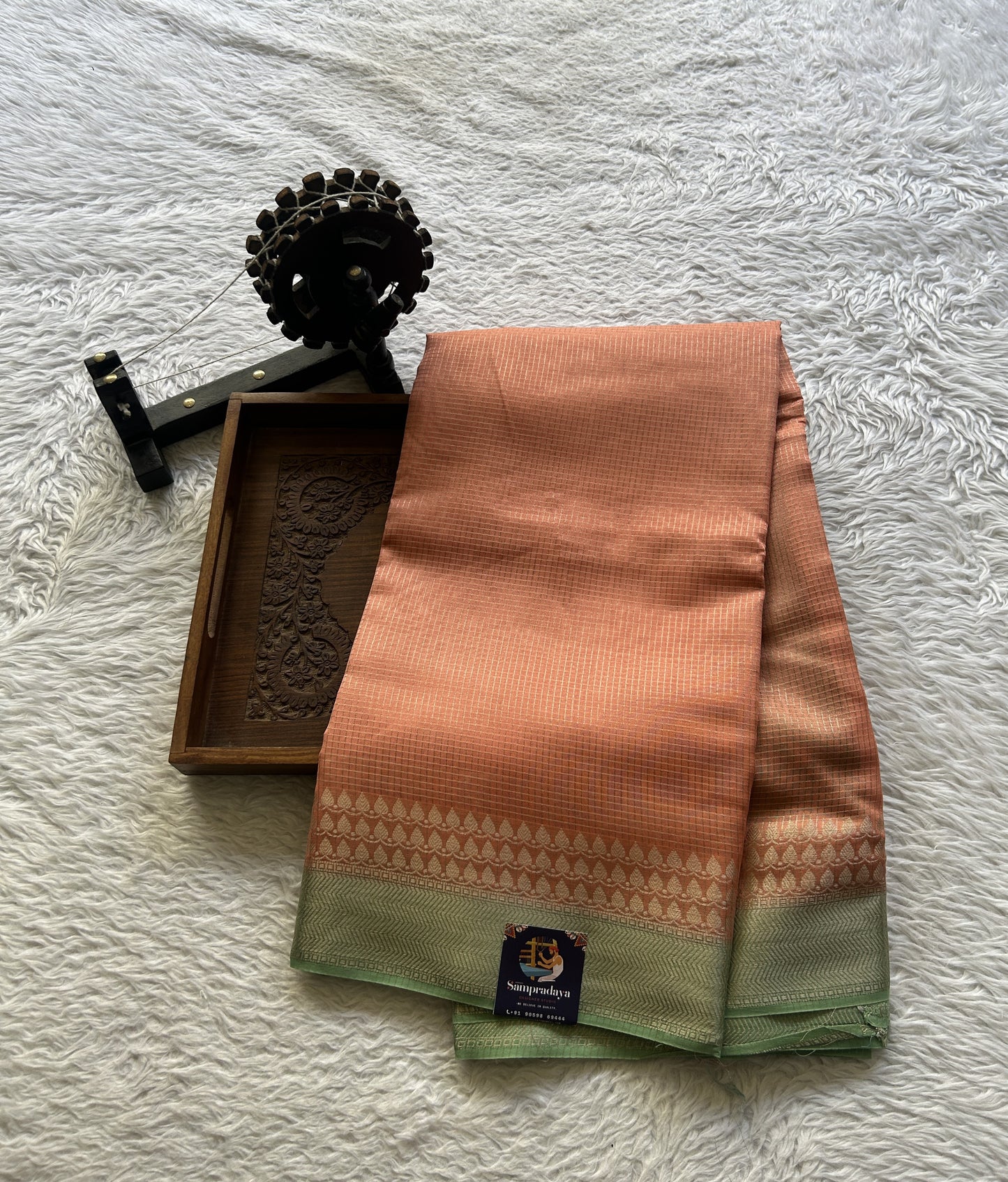 Viscose Georgette Saree Peach Colored Complemented with a Light Green Color Zari Border. - Sampradaya Designer Studio