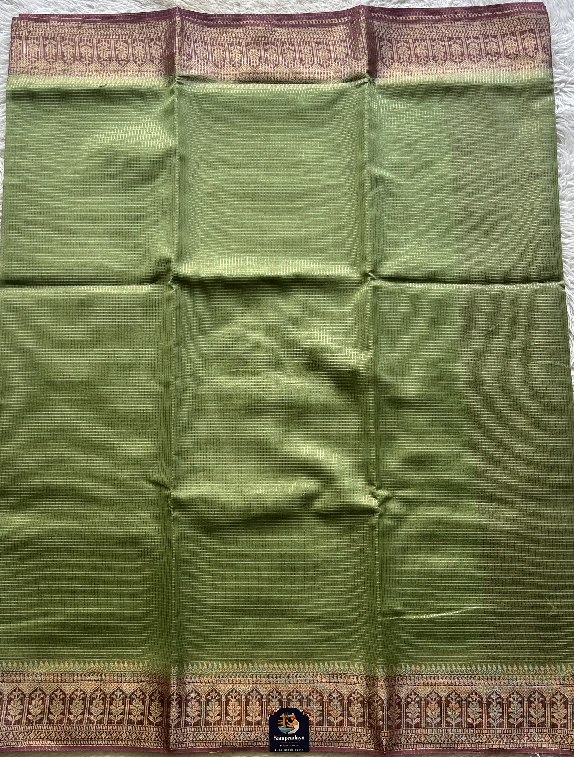 Viscose Georgette Saree Light Green Colored Complemented with a Lavender Color Zari Border. - Sampradaya Designer Studio