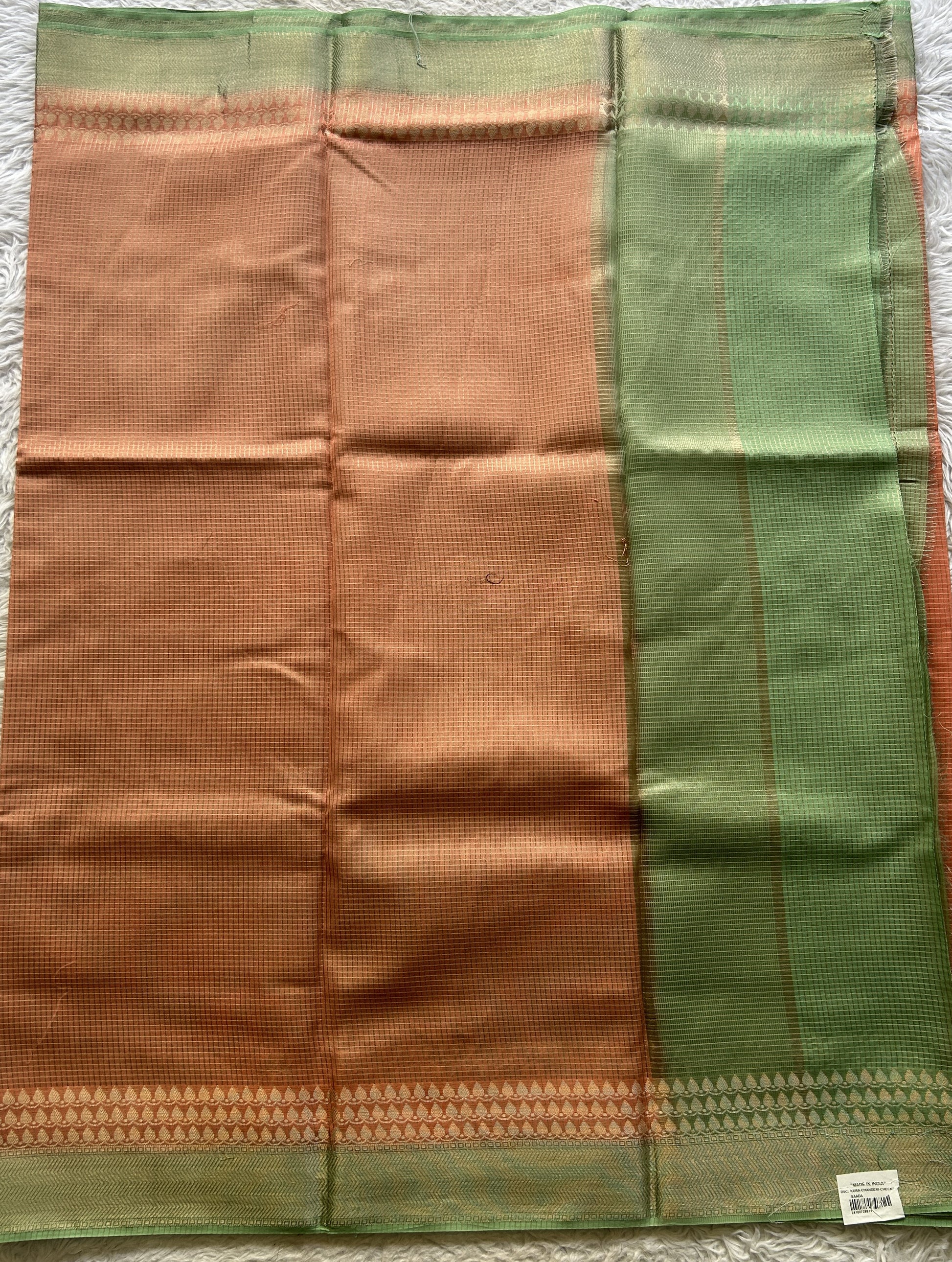 Viscose Georgette Saree Peach Colored Complemented with a Light Green Color Zari Border. - Sampradaya Designer Studio