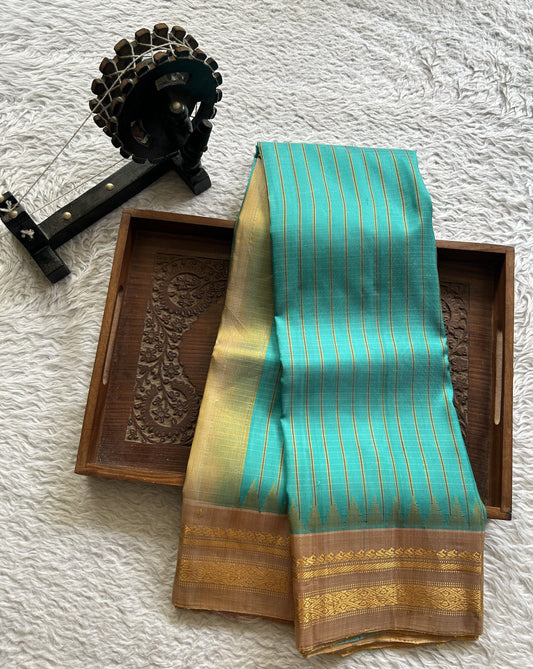 Gadwal Silk Saree Teal blue Colored Complemented With Beige color and gold Zari Weaving Border - Sampradaya Designer Studio