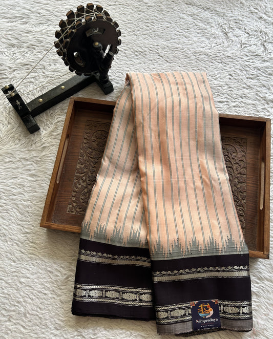 Gadwal Silk Saree peach Colored Complemented With Black color and Silver Zari Weaving Border - Sampradaya Designer Studio