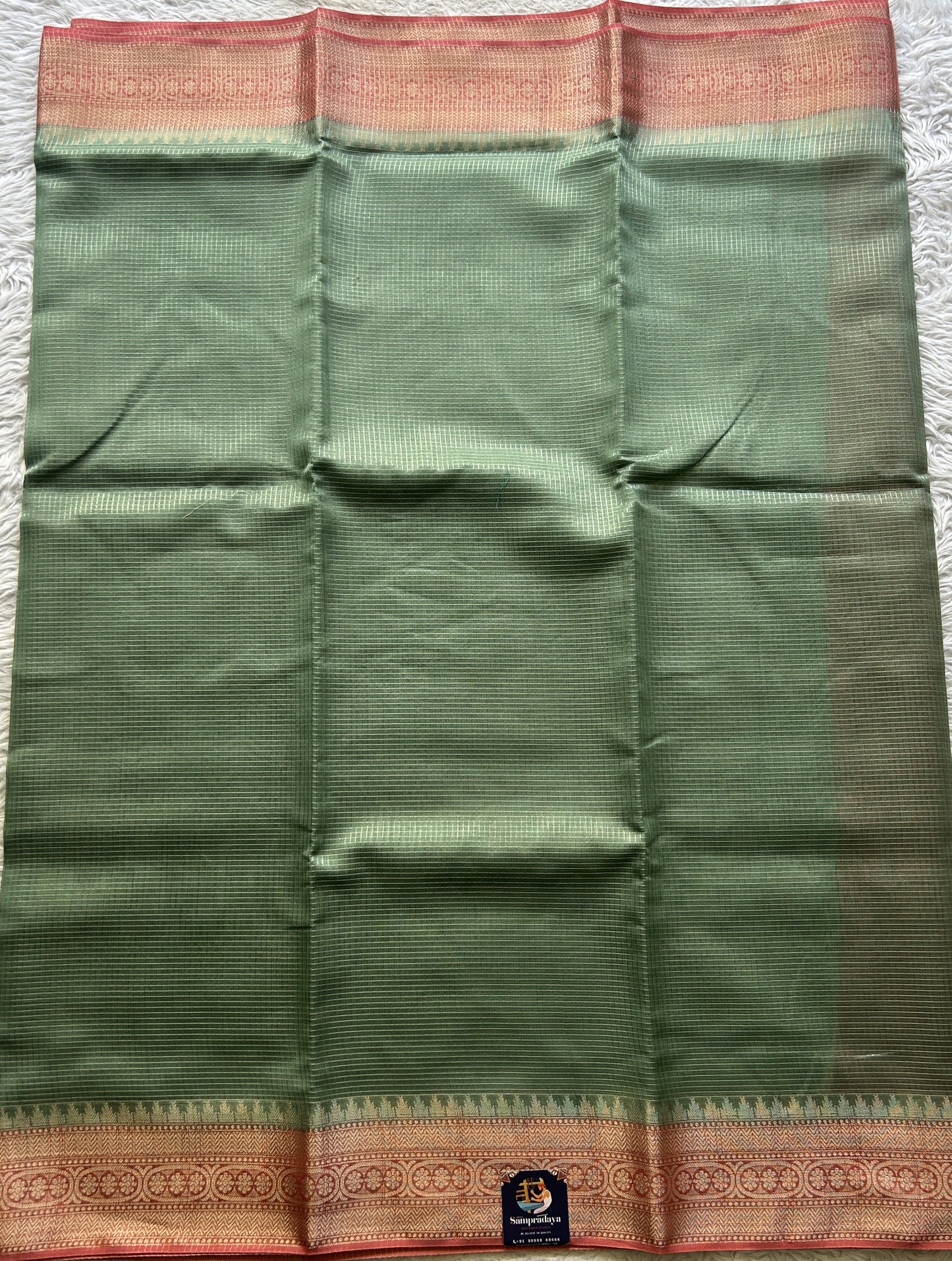 Viscose Georgette Saree Sea Green Colored Complemented with a peach Color Zari Border. - Sampradaya Designer Studio