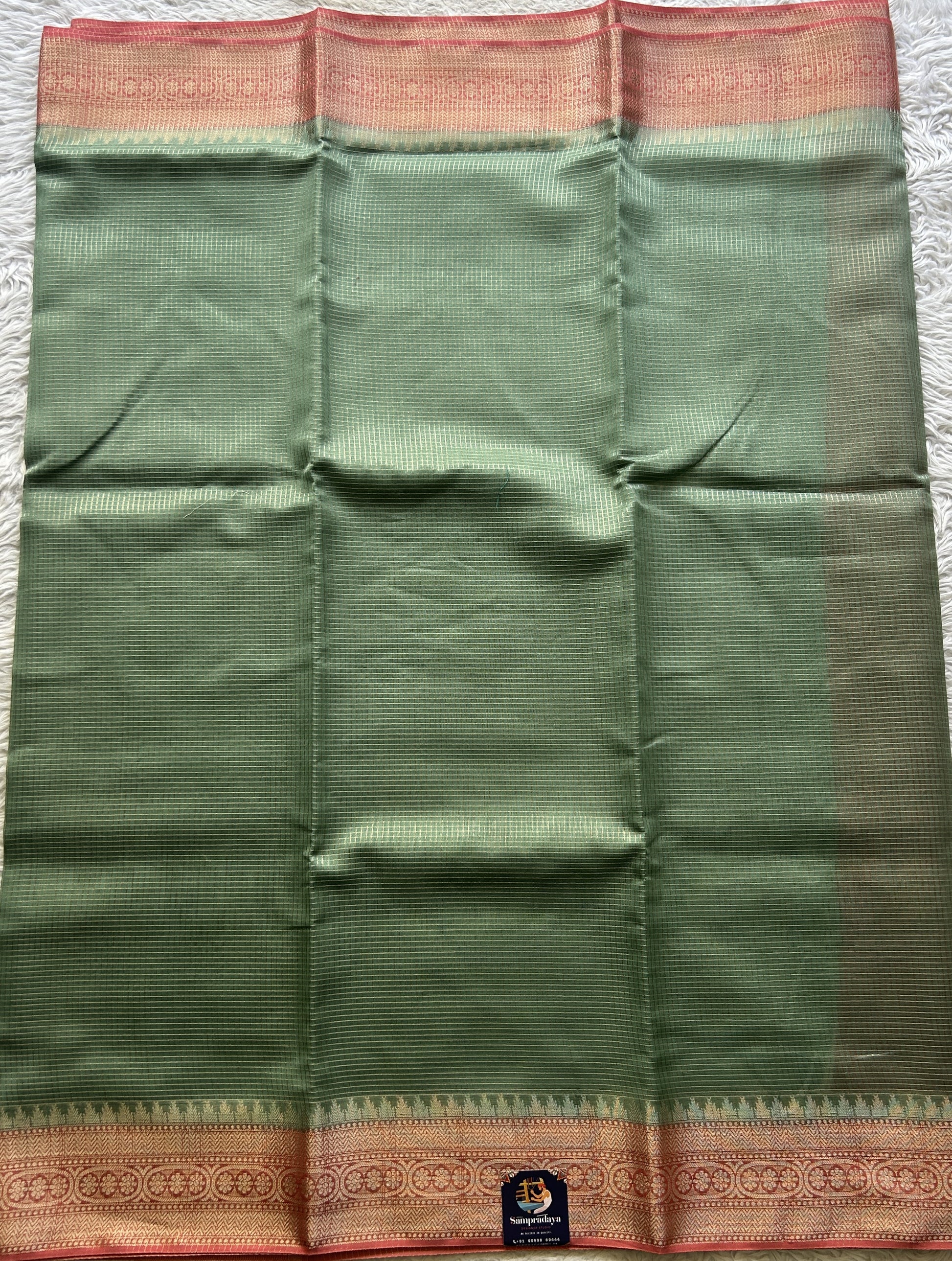 Viscose Georgette Saree Sea Green Colored Complemented with a peach Color Zari Border. - Sampradaya Designer Studio