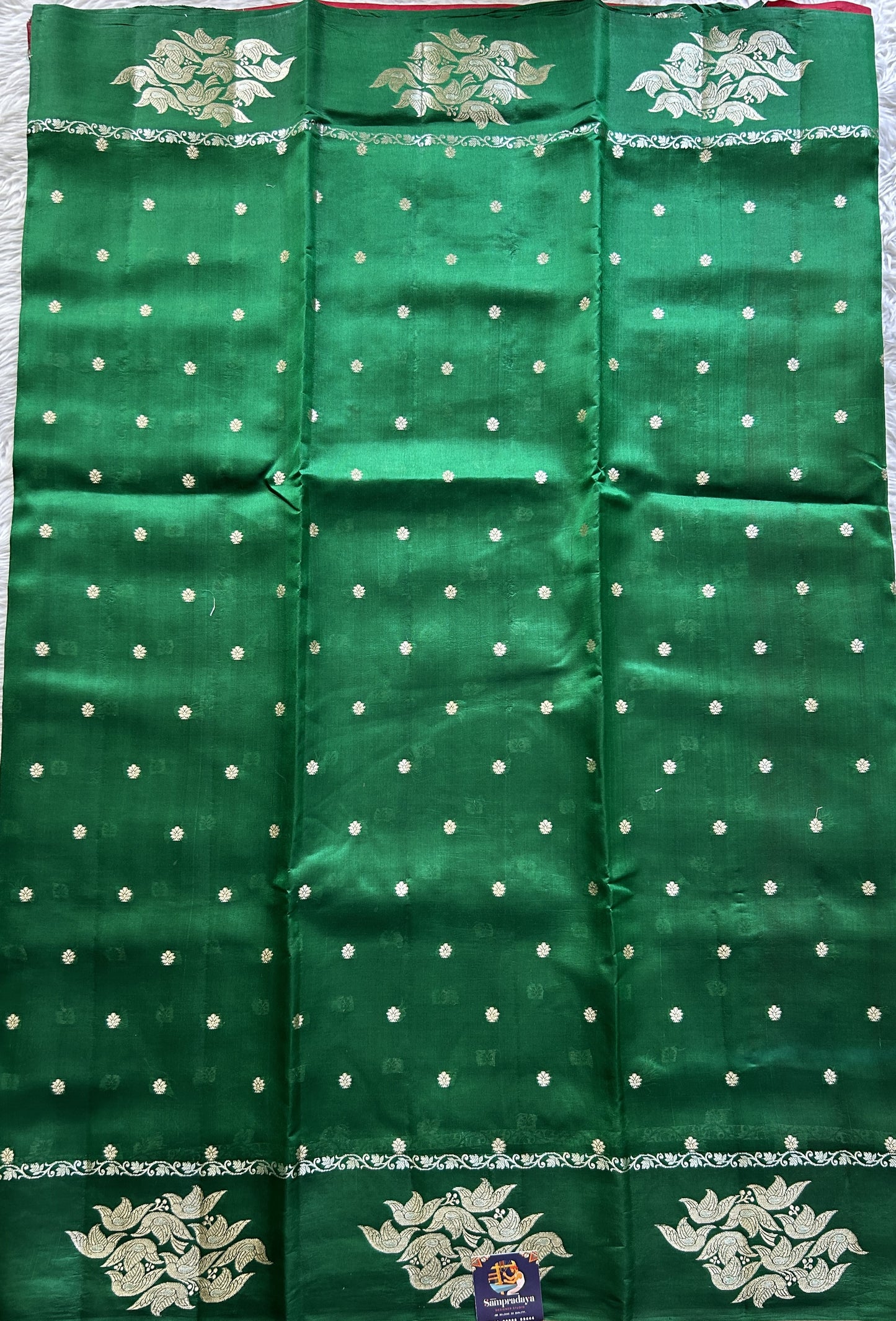 Dupion Silk Saree Green Colored Complemented with a Buti Border. - Sampradaya Designer Studio
