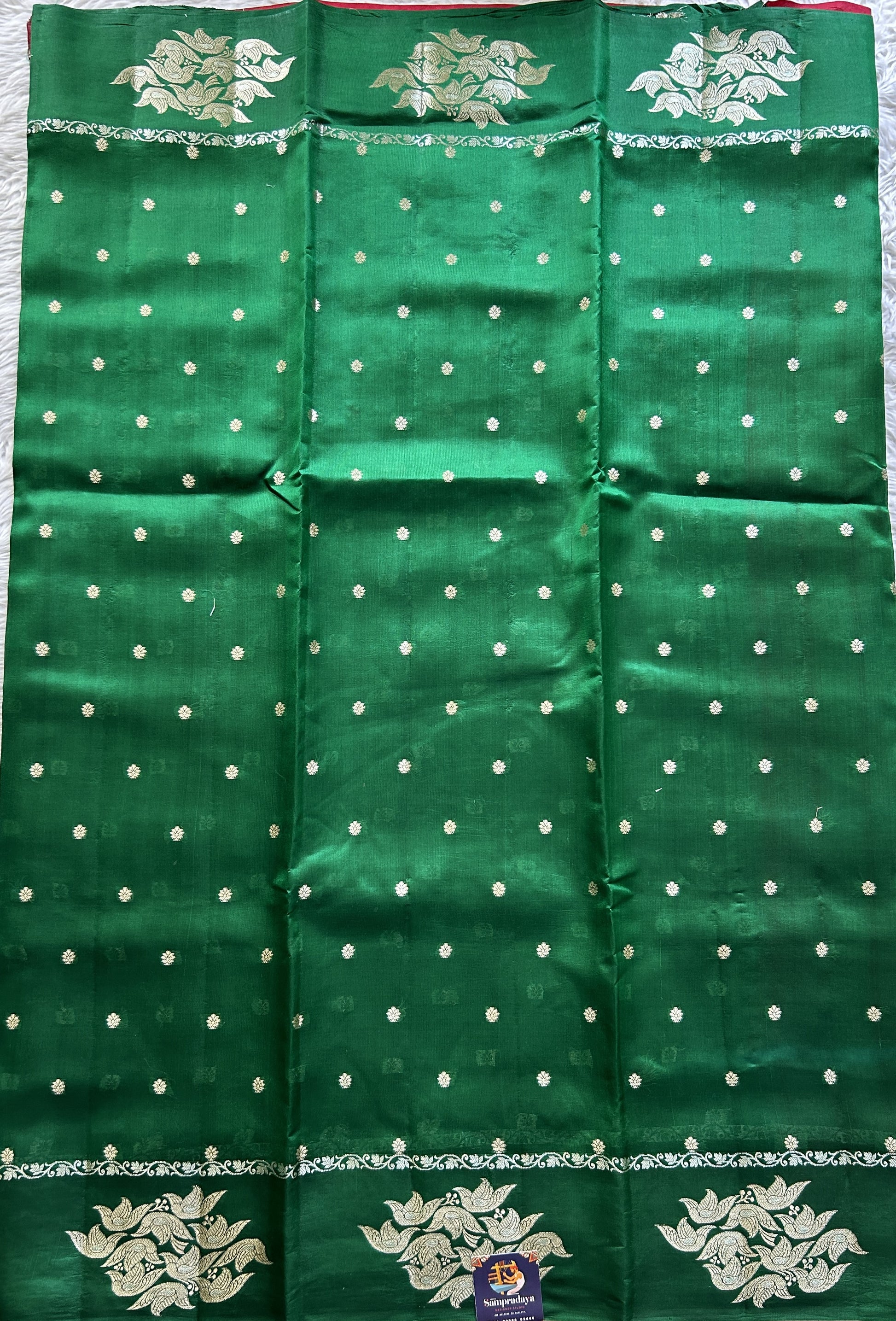 Dupion Silk Saree Green Colored Complemented with a Buti Border. - Sampradaya Designer Studio