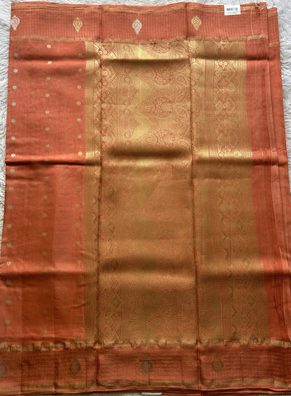 Satin Georgette Saree Pale Orange Colored Elegantly Paired with a Zari Border. - Sampradaya Designer Studio