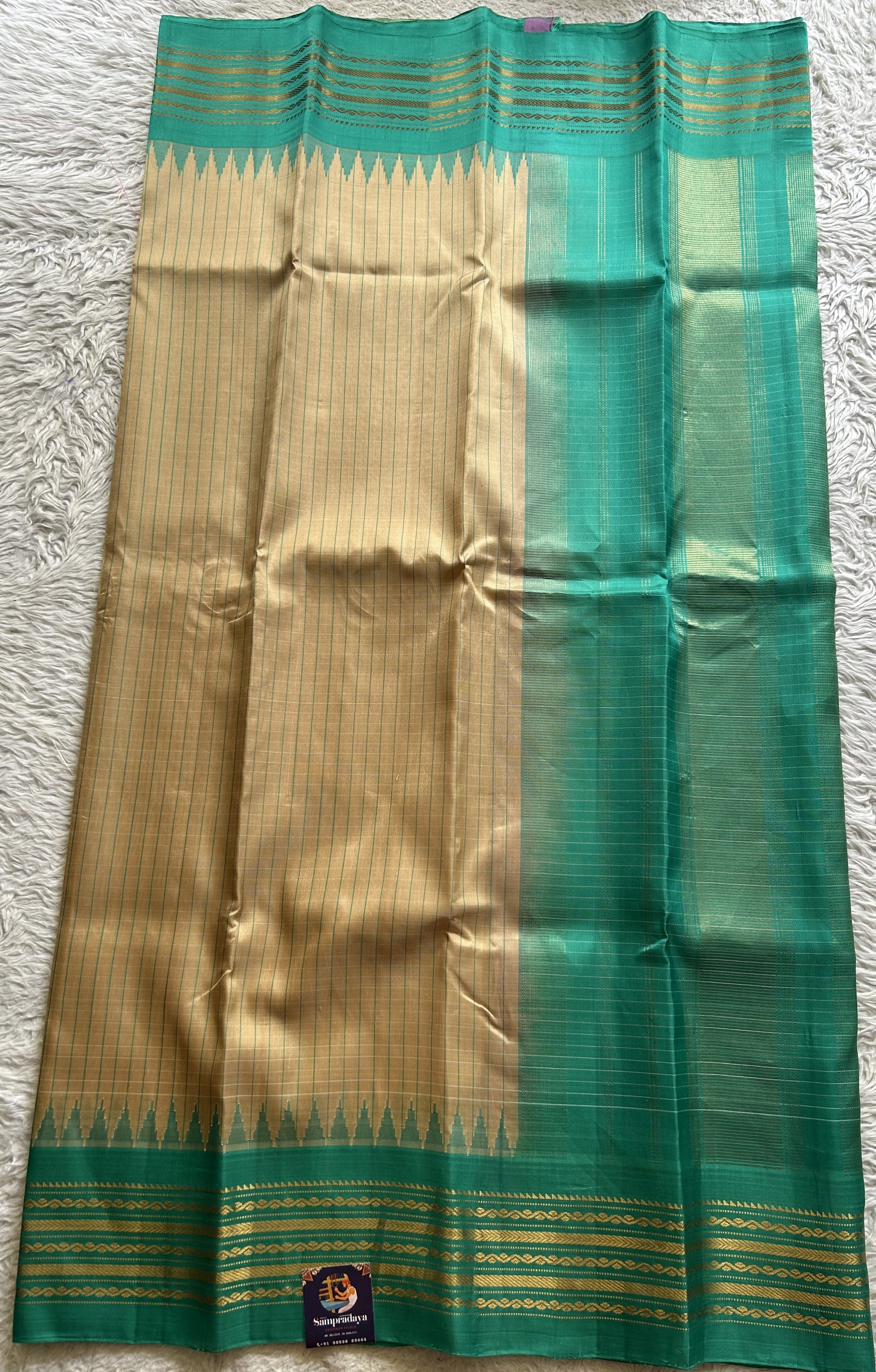 Gadwal Silk Saree Teal blue Colored Complemented With Beige color and gold Zari Weaving Border - Sampradaya Designer Studio