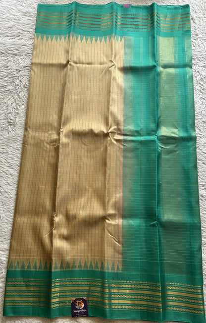 Gadwal Silk Saree Teal blue Colored Complemented With Beige color and gold Zari Weaving Border - Sampradaya Designer Studio
