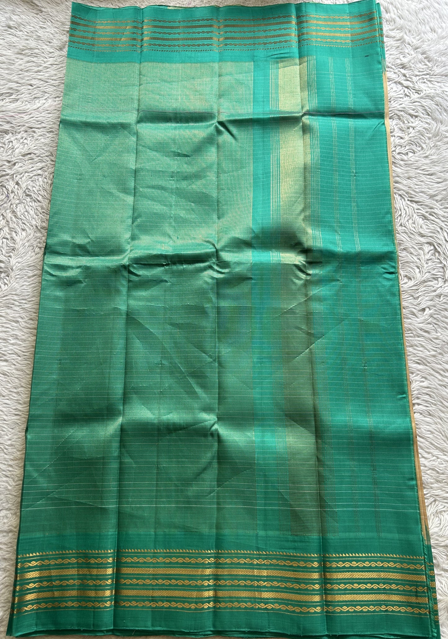 Gadwal Silk Saree Teal blue Colored Complemented With Beige color and gold Zari Weaving Border - Sampradaya Designer Studio