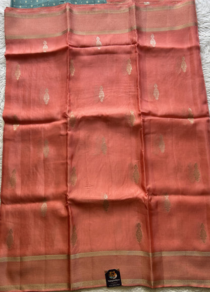 Satin Georgette Saree Peach Colored Elegantly Paired with a Zari Border. - Sampradaya Designer Studio