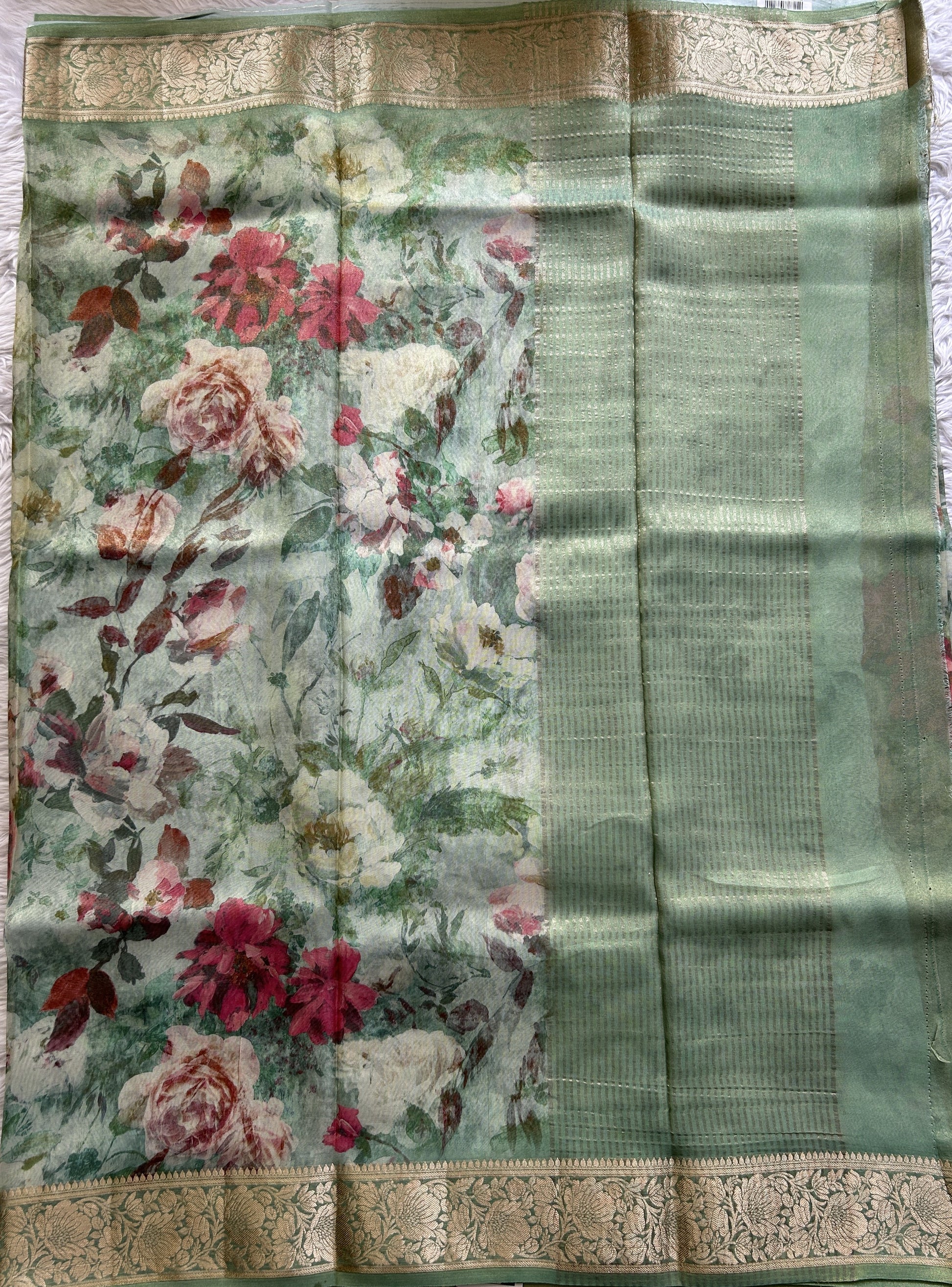 Viscose Tissue Georgette Saree Light Sea Green Colored Complemented with a Zari Border. - Sampradaya Designer Studio