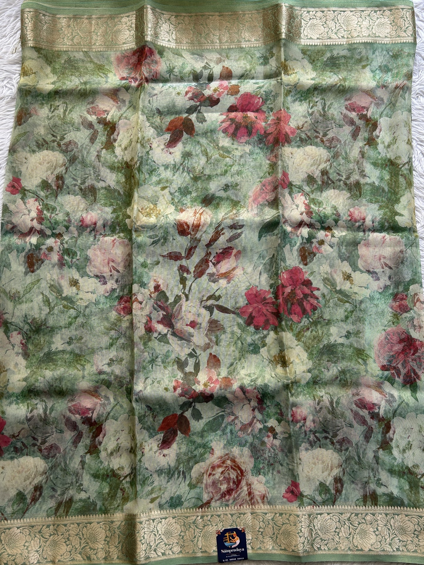Viscose Tissue Georgette Saree Light Sea Green Colored Complemented with a Zari Border. - Sampradaya Designer Studio