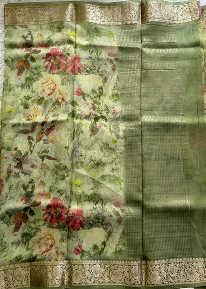 Viscose Tissue Georgette Saree Light Green Colored Complemented with a Zari Border. - Sampradaya Designer Studio