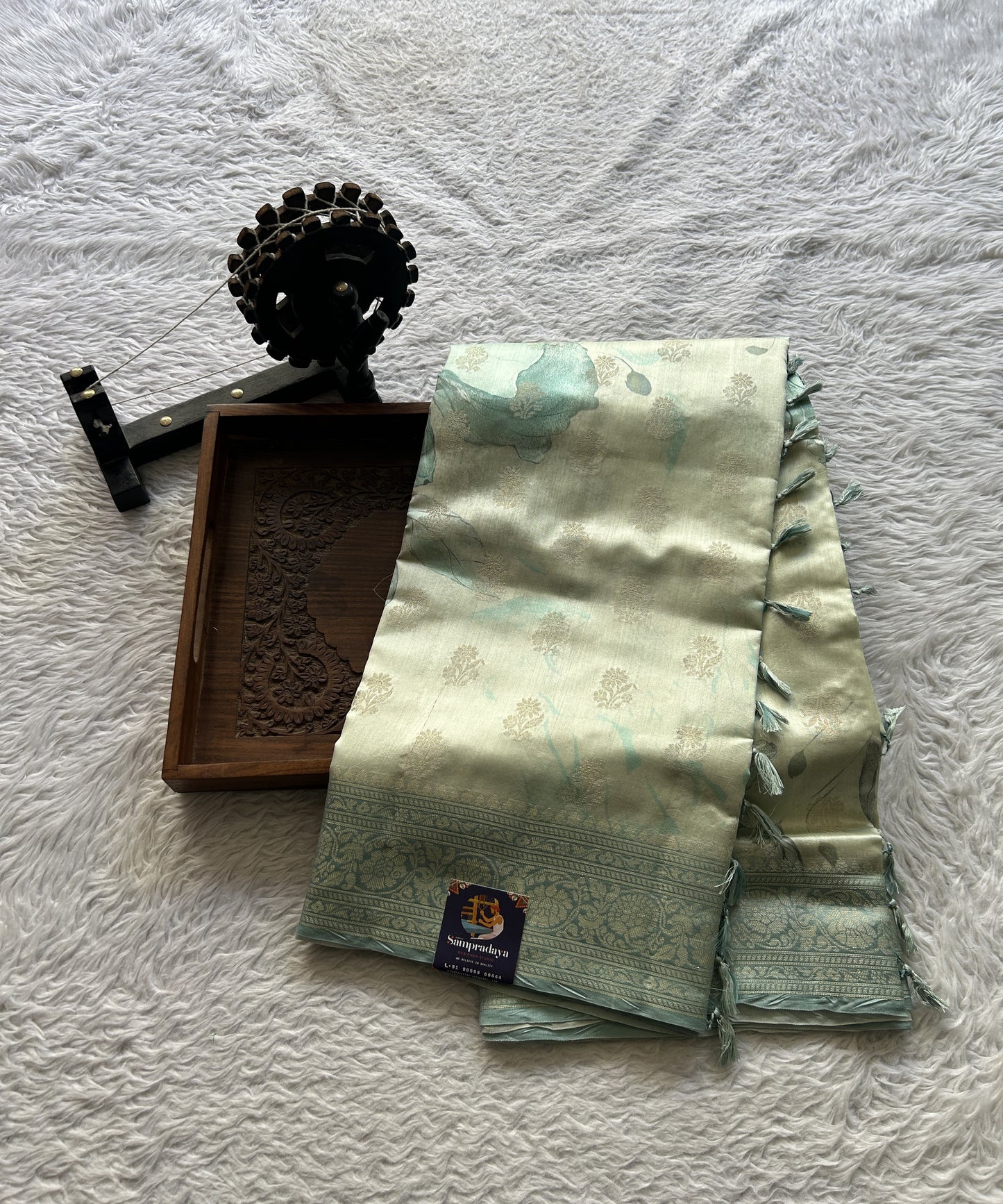 Chiniya Silk Saree Off White Colored Elegantly Paired with a Sea Blue Color Zari Border. - Sampradaya Designer Studio