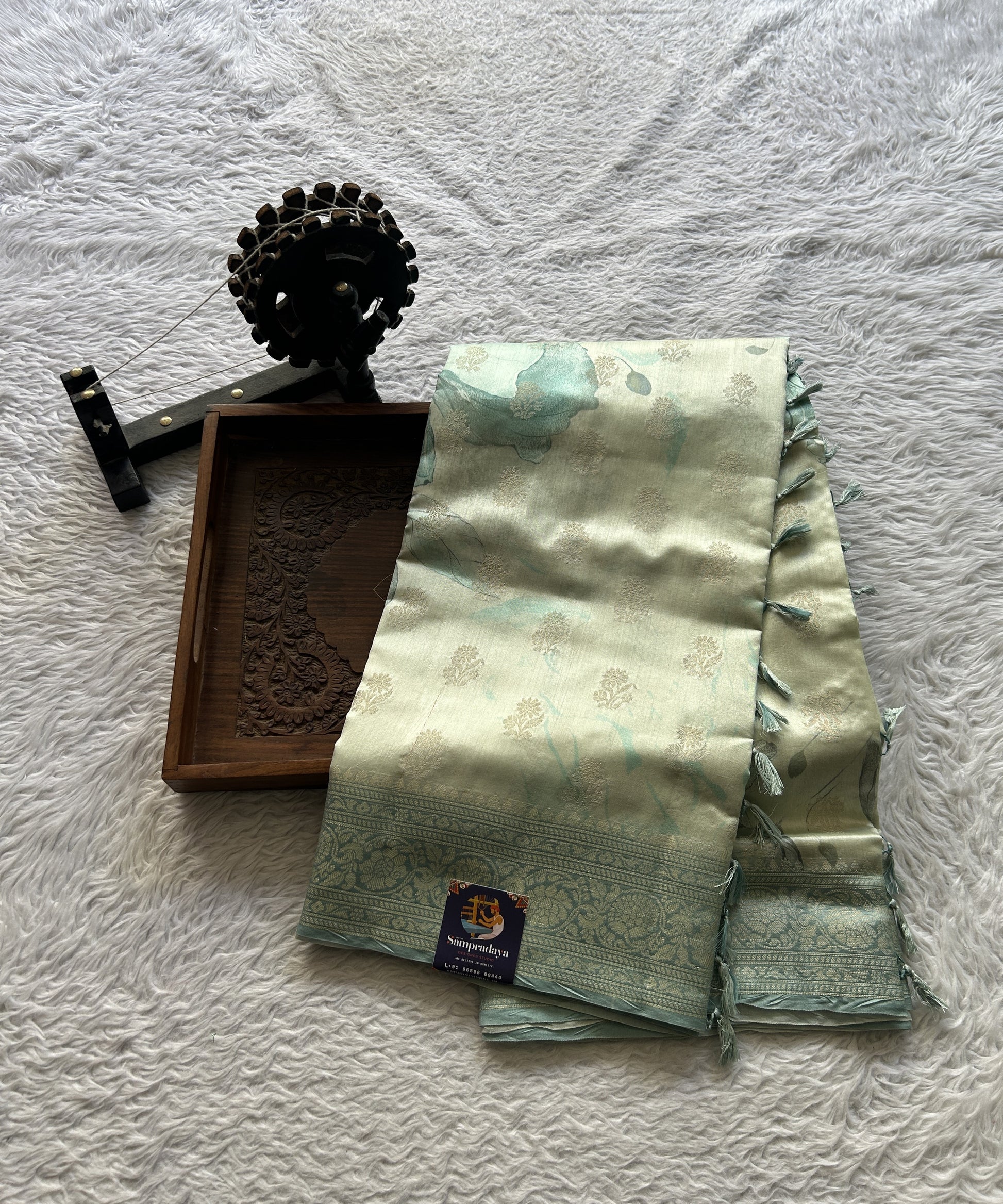 Chiniya Silk Saree Off White Colored Elegantly Paired with a Sea Blue Color Zari Border. - Sampradaya Designer Studio