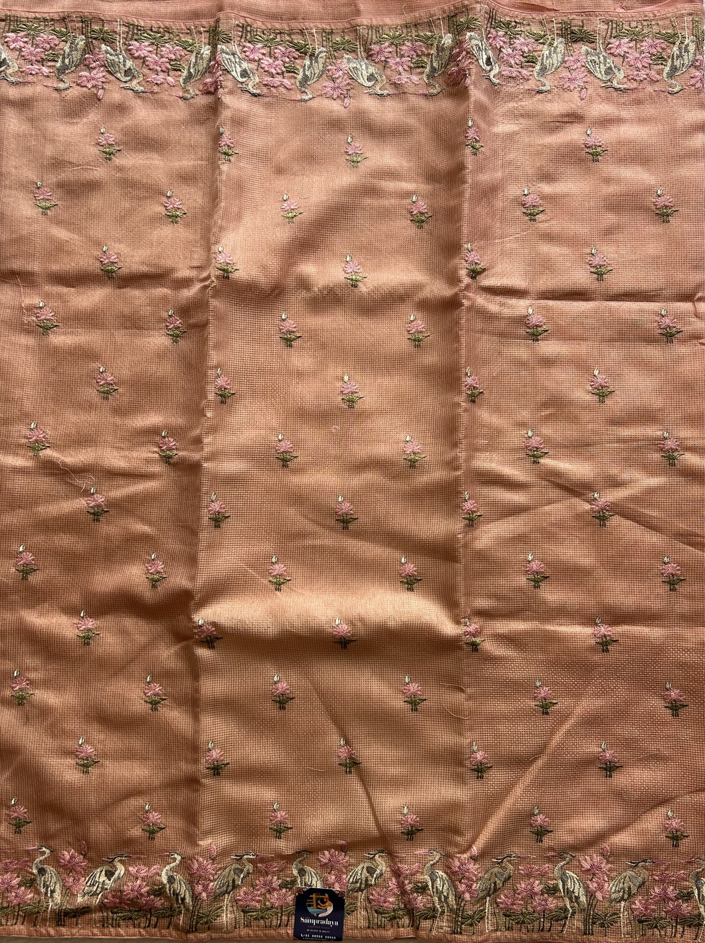 Maheshwari Chanderi Cotton Checks Saree Peach Colored Complemented with a Machine Embroidered And Gold Zari Border. - Sampradaya Designer Studio