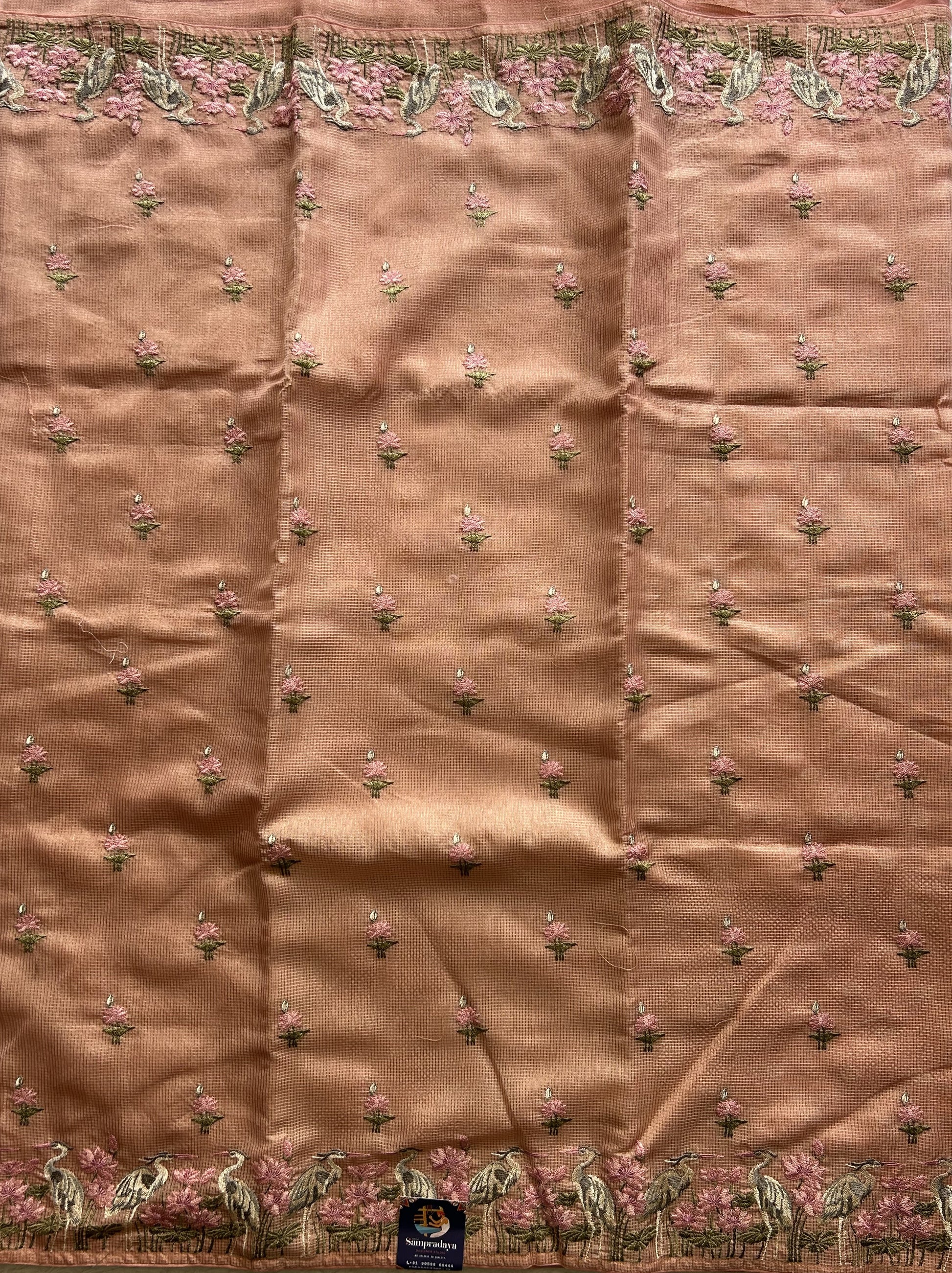 Maheshwari Chanderi Cotton Checks Saree Peach Colored Complemented with a Machine Embroidered And Gold Zari Border. - Sampradaya Designer Studio