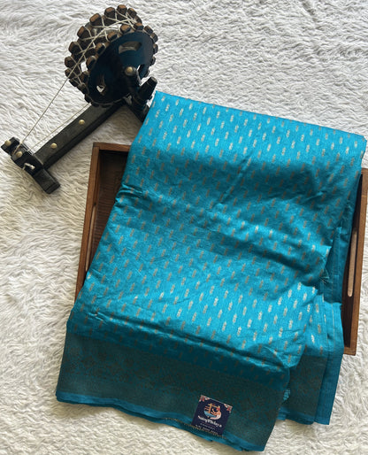 Semi Raw Silk Saree Blue Colored Elegantly paired with a Silver Zari Border. - Sampradaya Designer Studio