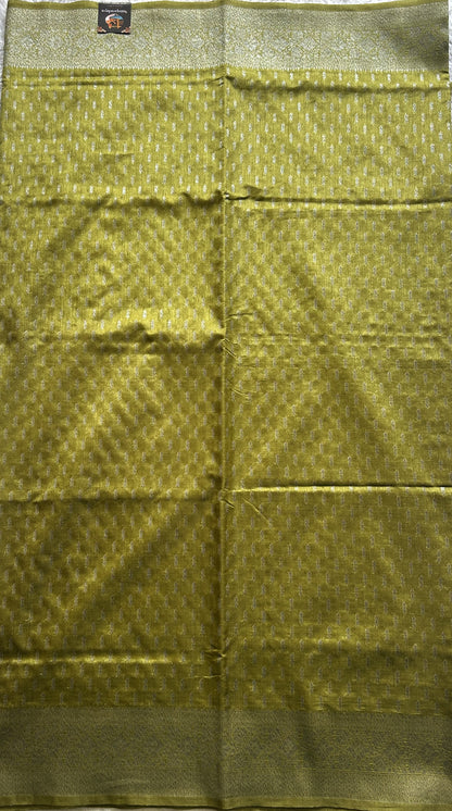 Semi Raw Silk Saree Mustard Colored Elegantly paired with a Silver Zari Border. - Sampradaya Designer Studio