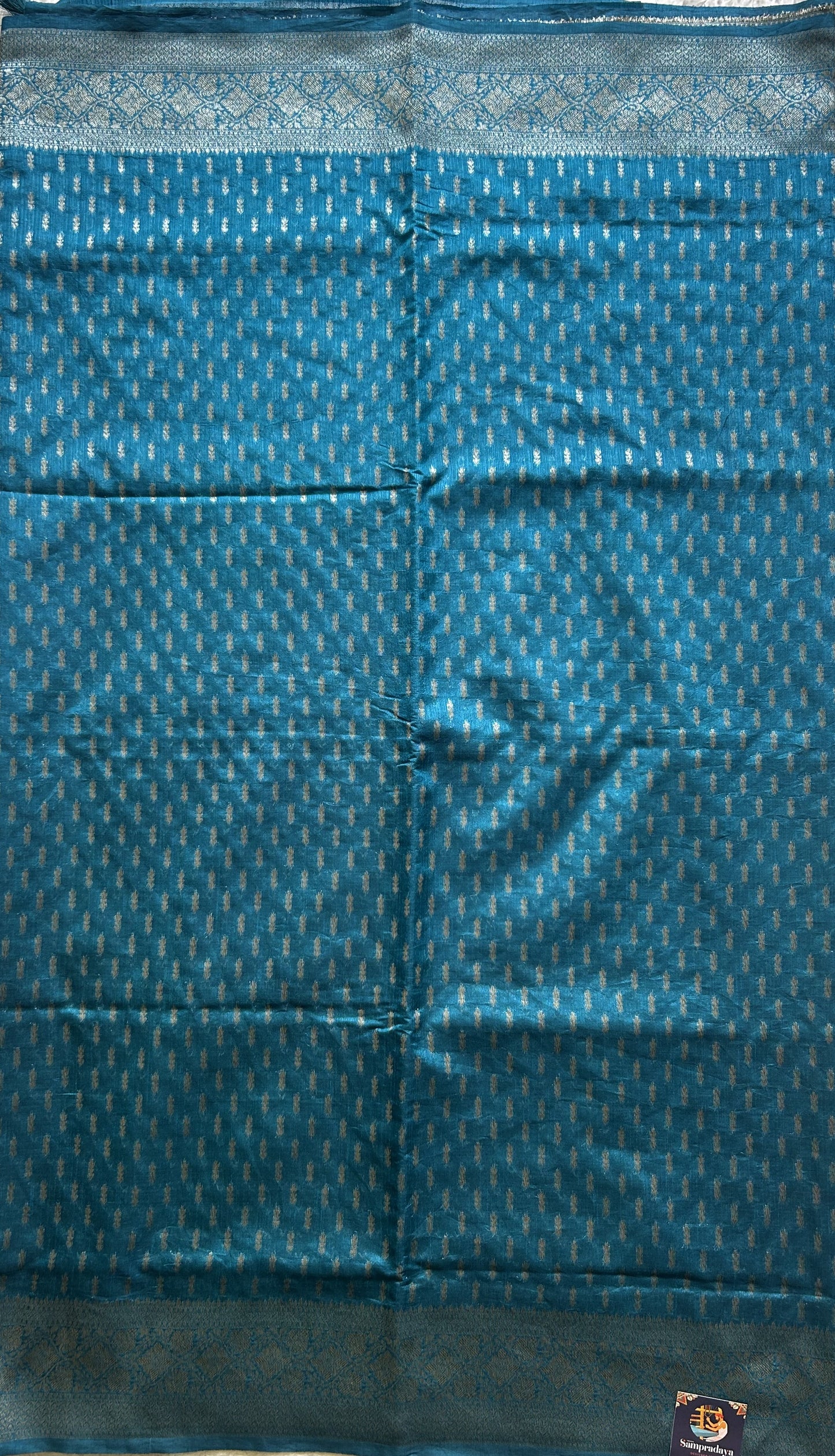 Semi Raw Silk Saree dark Blue Colored Elegantly paired with a Silver Zari Border. - Sampradaya Designer Studio