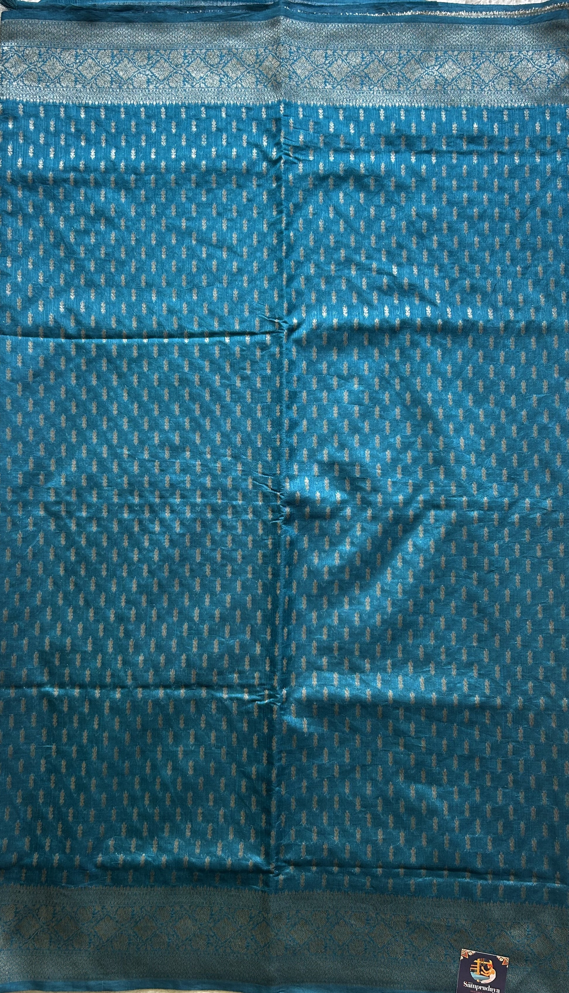 Semi Raw Silk Saree dark Blue Colored Elegantly paired with a Silver Zari Border. - Sampradaya Designer Studio