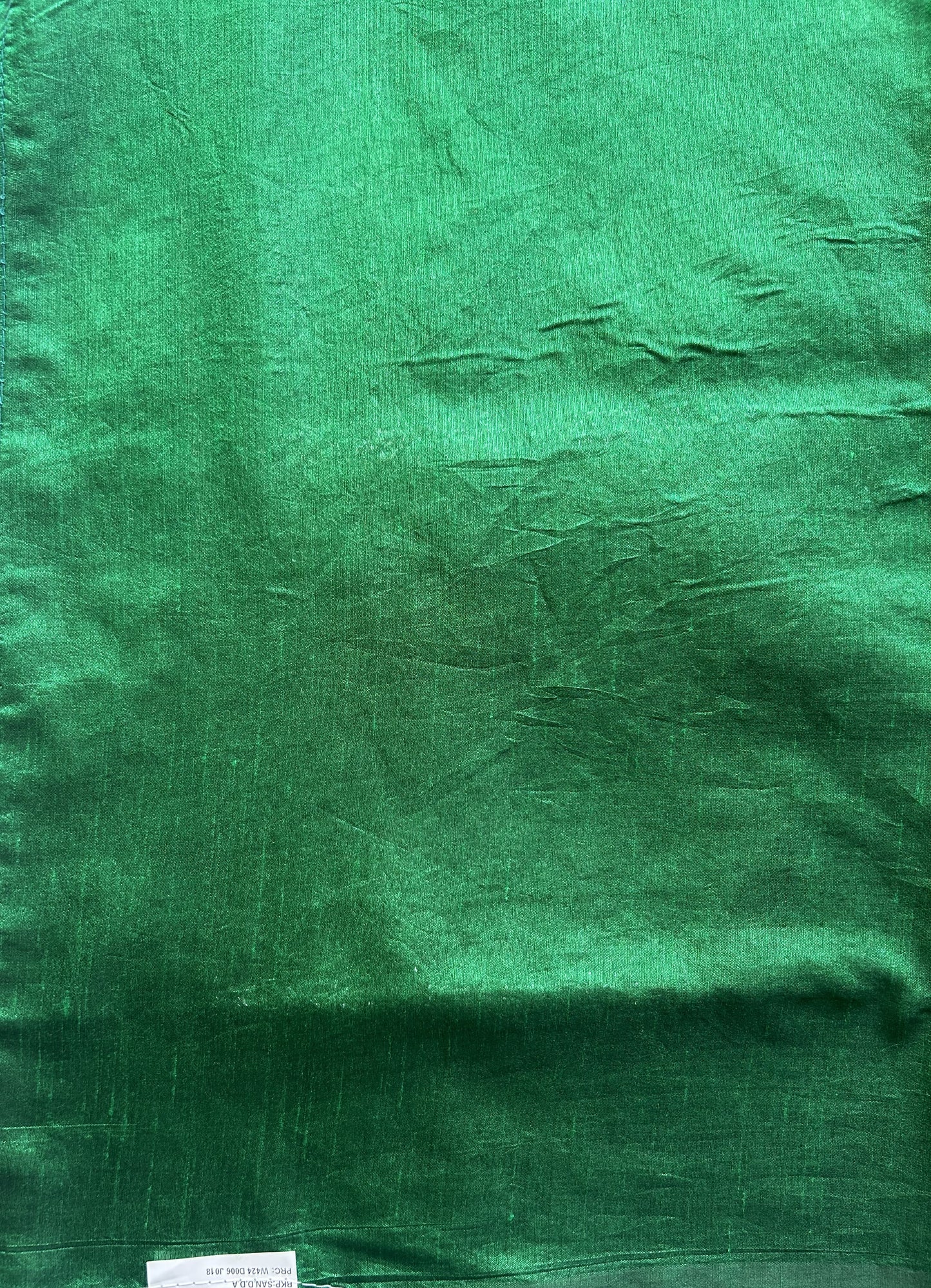 Semi Raw Silk Saree Green Colored Elegantly paired with a Silver Zari Border. - Sampradaya Designer Studio