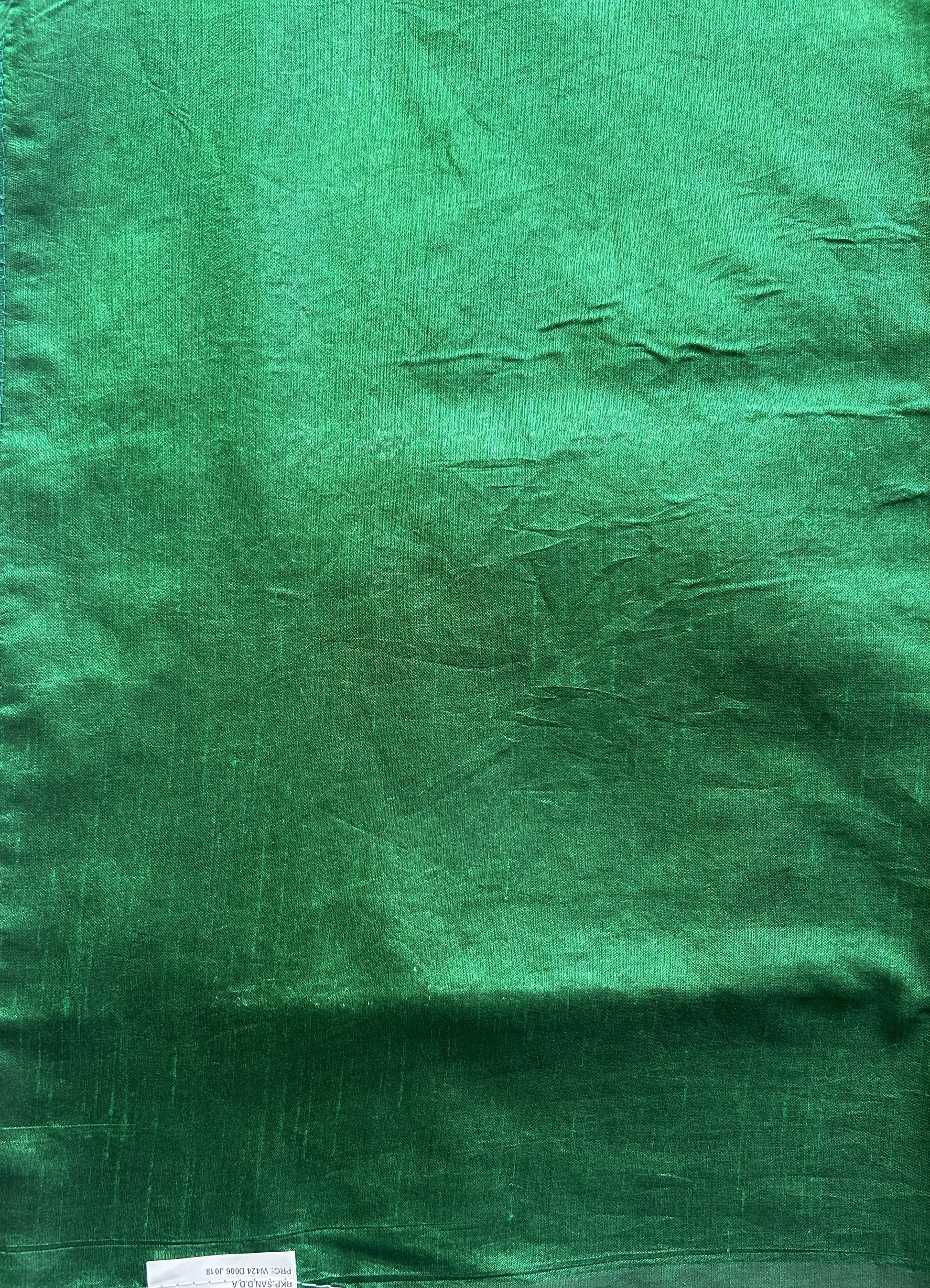 Semi Raw Silk Saree Green Colored Elegantly paired with a Silver Zari Border. - Sampradaya Designer Studio