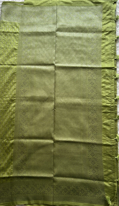 Semi Raw Silk Saree Light Green Colored Elegantly paired with a Silver Zari Border. - Sampradaya Designer Studio