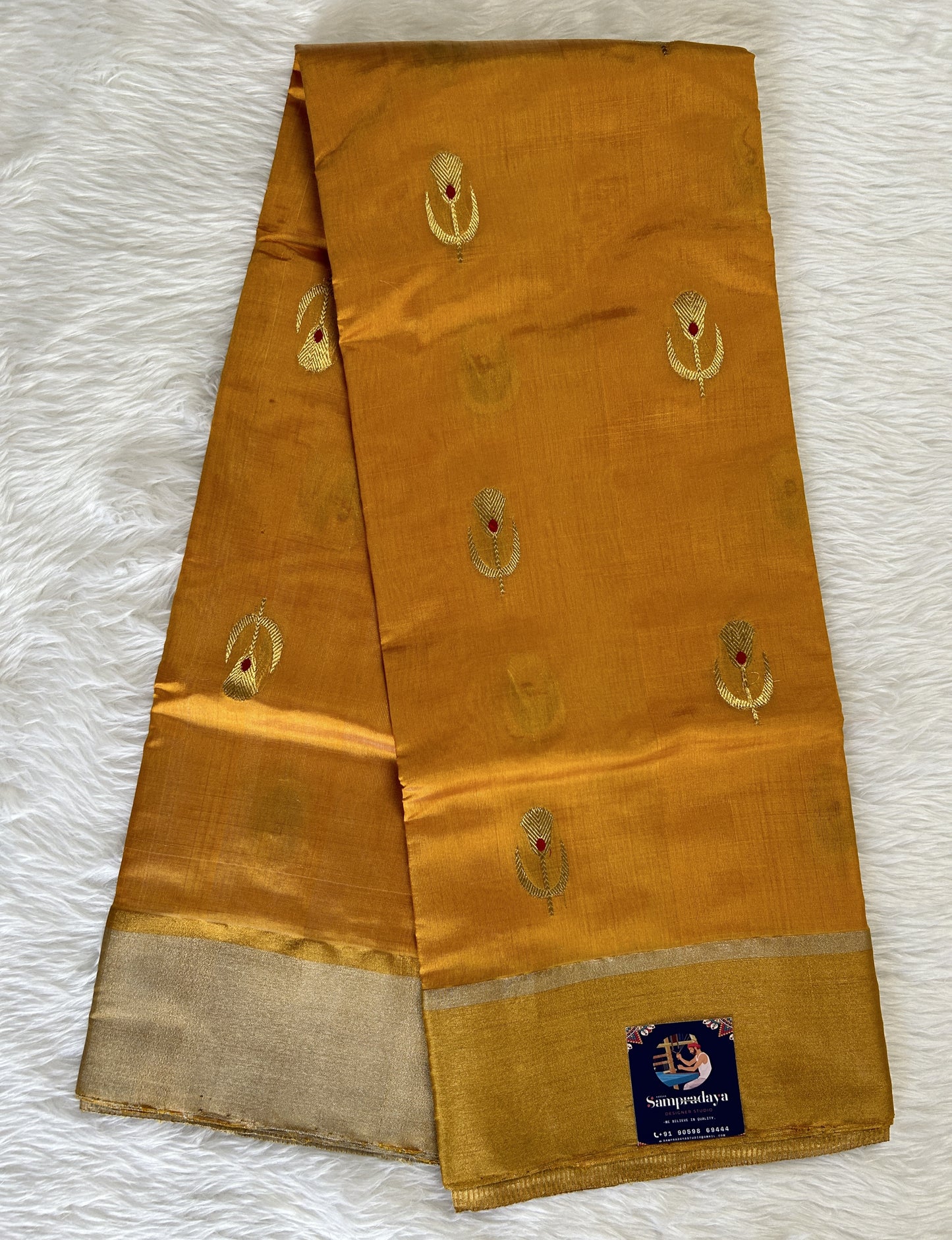 Chanderi Pattu Saree Mango Yellow colored saree complemented with a Gold Zari Weaving  Plain border - Sampradaya Designer Studio