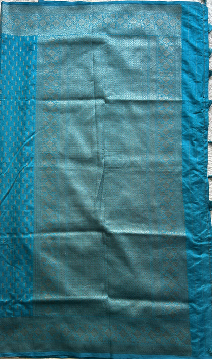 Semi Raw Silk Saree Blue Colored Elegantly paired with a Silver Zari Border. - Sampradaya Designer Studio