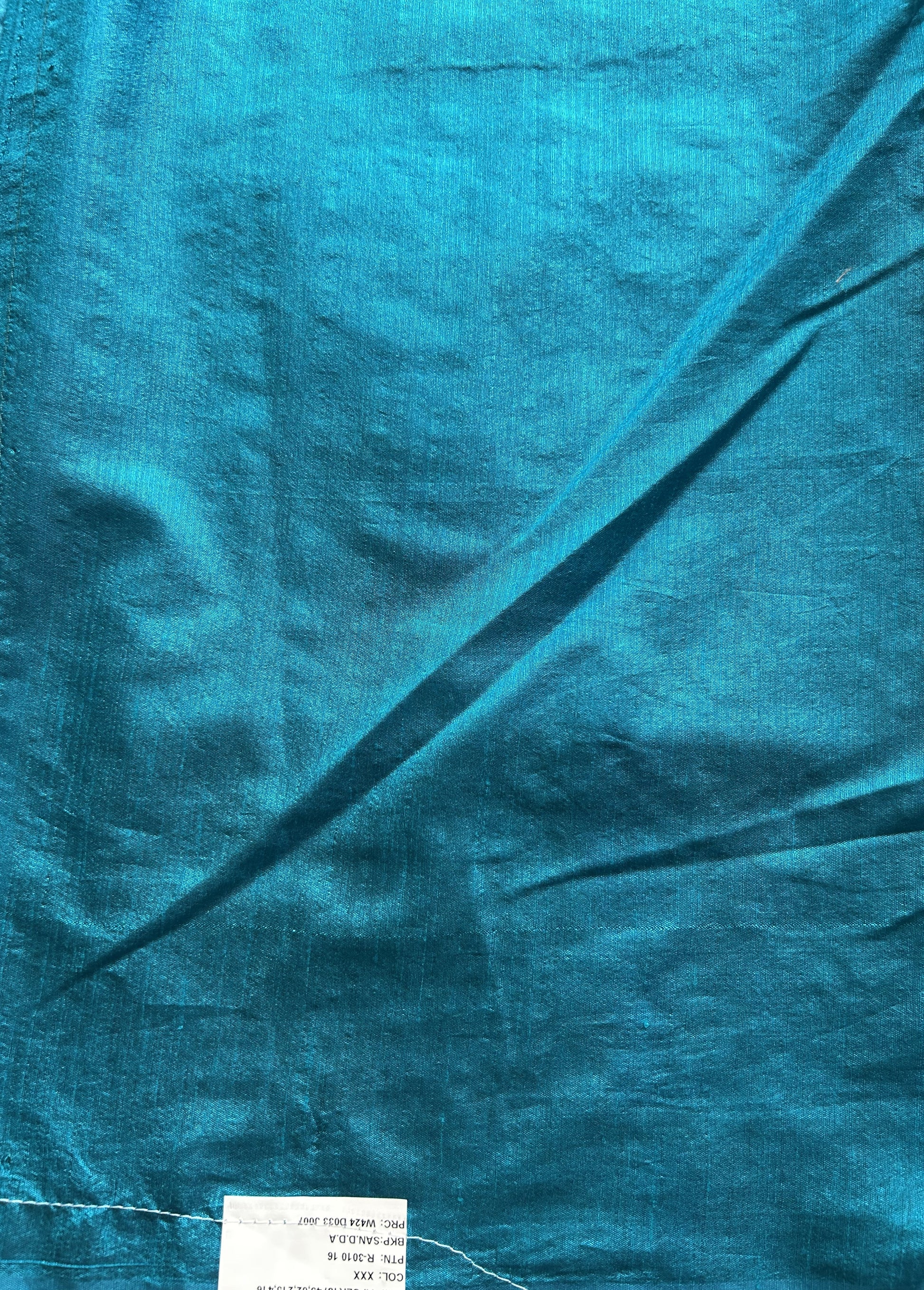 Semi Raw Silk Saree Blue Colored Elegantly paired with a Silver Zari Border. - Sampradaya Designer Studio