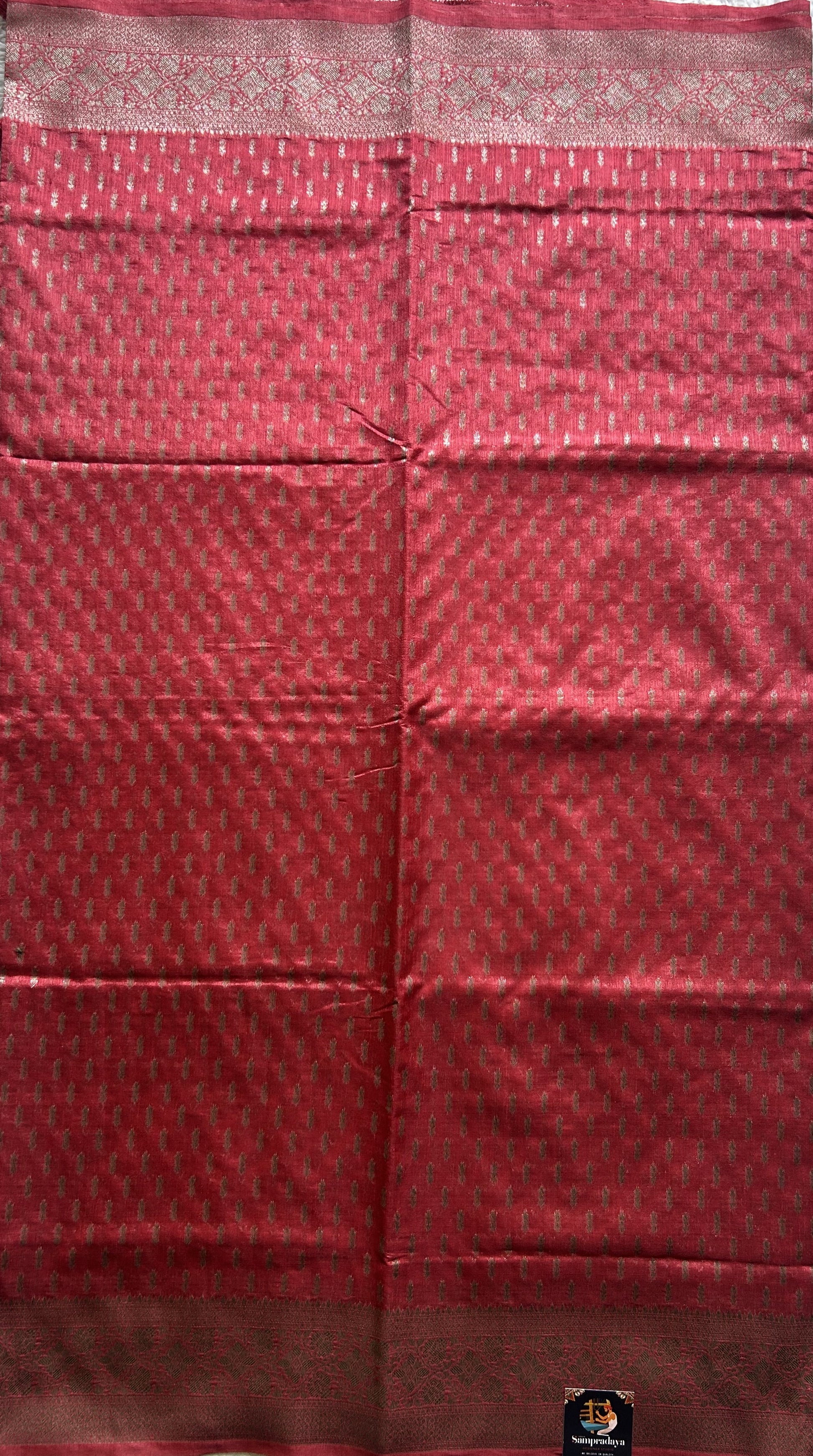 Semi Raw Silk Saree Dark Peach Colored Elegantly paired with a Silver Zari Border. - Sampradaya Designer Studio
