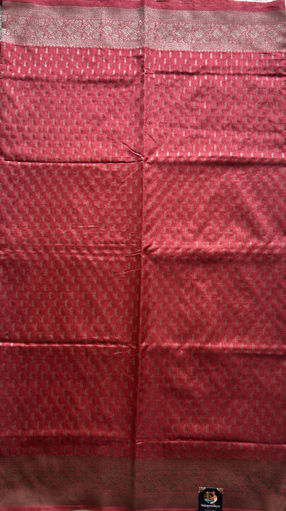 Semi Raw Silk Saree Dark Peach Colored Elegantly paired with a Silver Zari Border. - Sampradaya Designer Studio