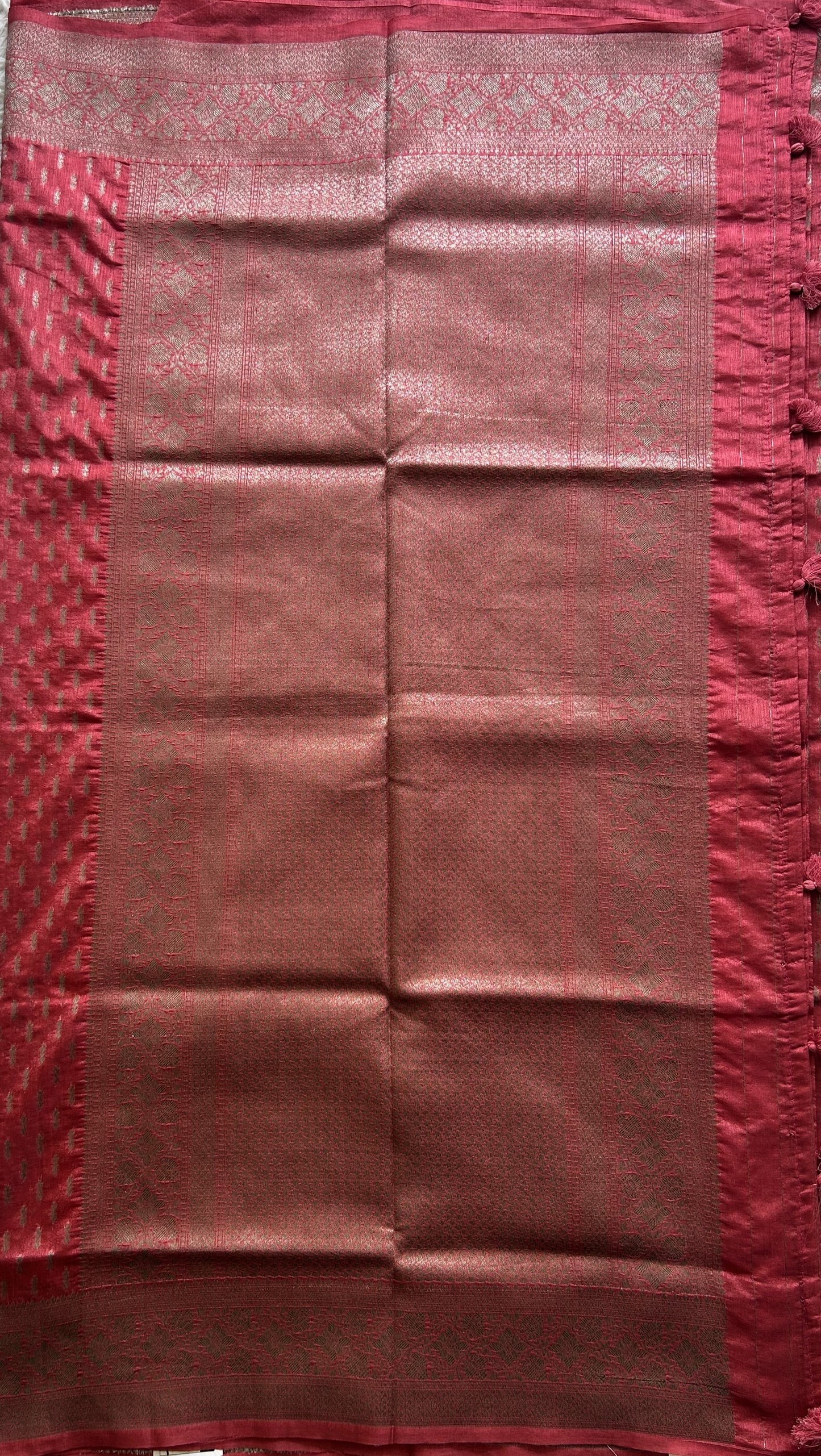 Semi Raw Silk Saree Dark Peach Colored Elegantly paired with a Silver Zari Border. - Sampradaya Designer Studio