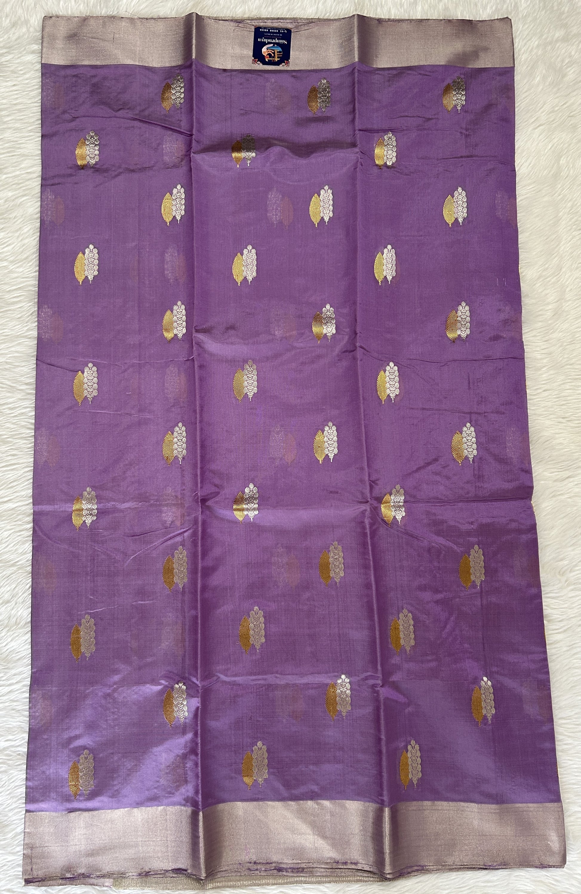 Chanderi Pattu Saree Dusty Purple colored saree complemented with a Silver Zari Weaving Plain border - Sampradaya Designer Studio
