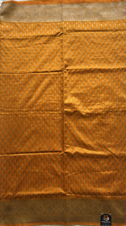Semi Raw Silk Saree  Yellow Colored Elegantly paired with a Silver Zari Border. - Sampradaya Designer Studio