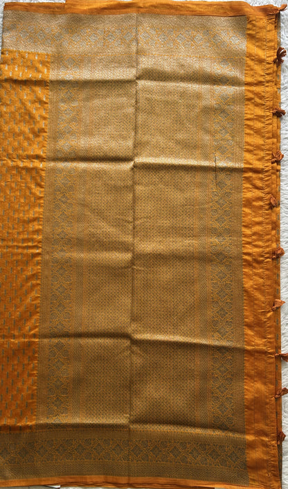 Semi Raw Silk Saree  Yellow Colored Elegantly paired with a Silver Zari Border. - Sampradaya Designer Studio