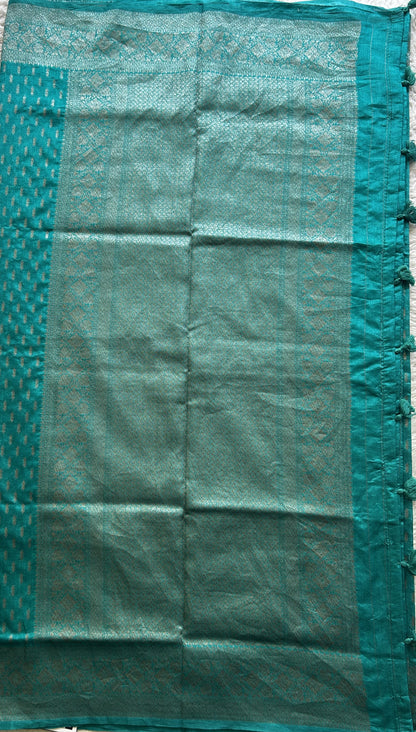 Semi Raw Silk Saree Teal Blue Colored Elegantly paired with a Silver Zari Border. - Sampradaya Designer Studio