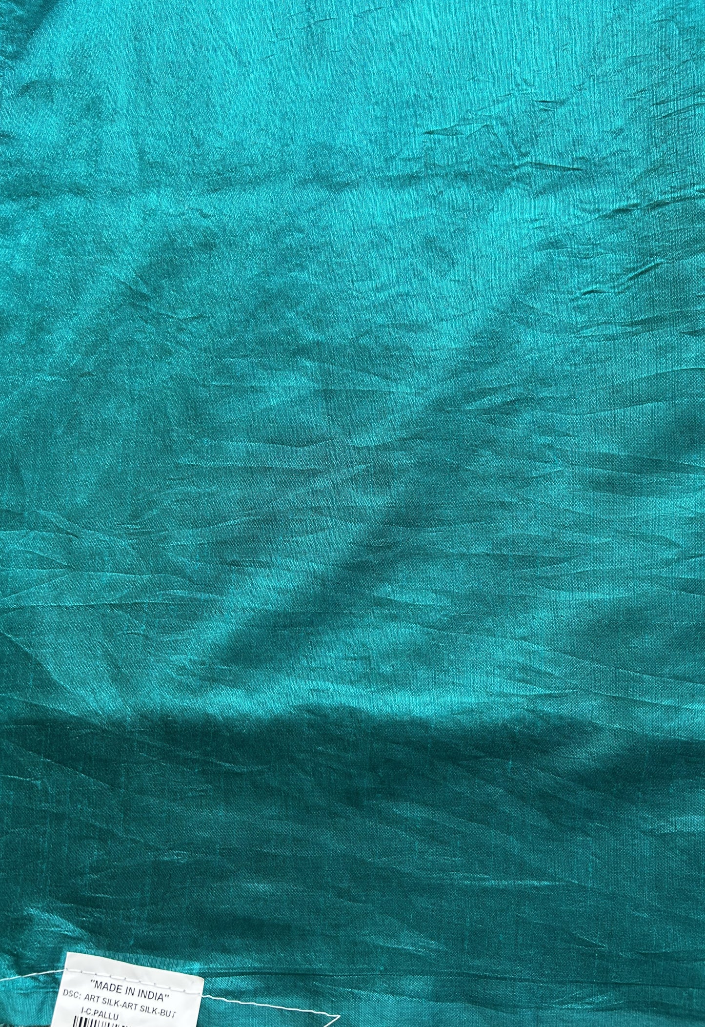 Semi Raw Silk Saree Teal Blue Colored Elegantly paired with a Silver Zari Border. - Sampradaya Designer Studio
