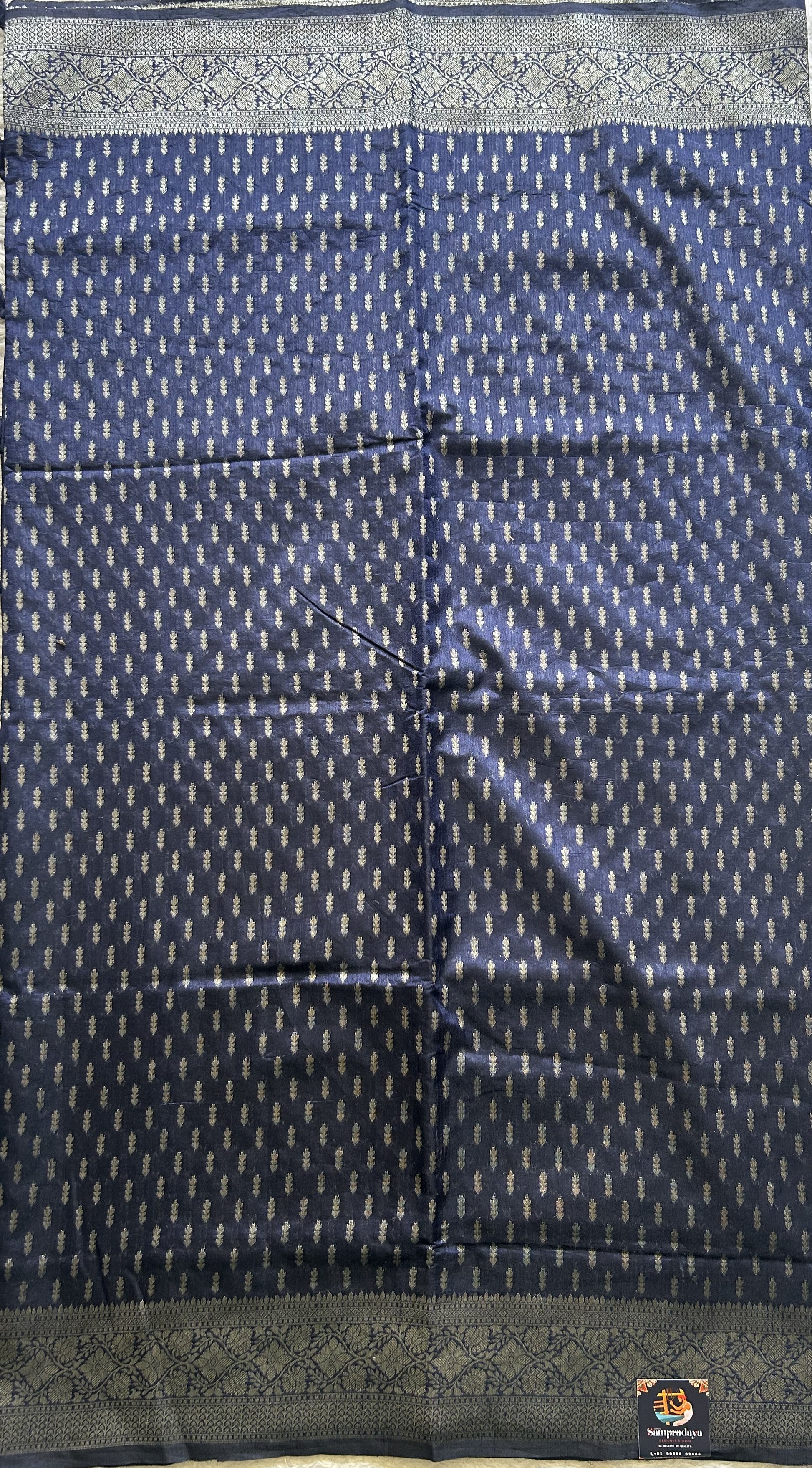 Semi Raw Silk Saree Ink Blue Colored Elegantly paired with a Silver Zari Border. - Sampradaya Designer Studio
