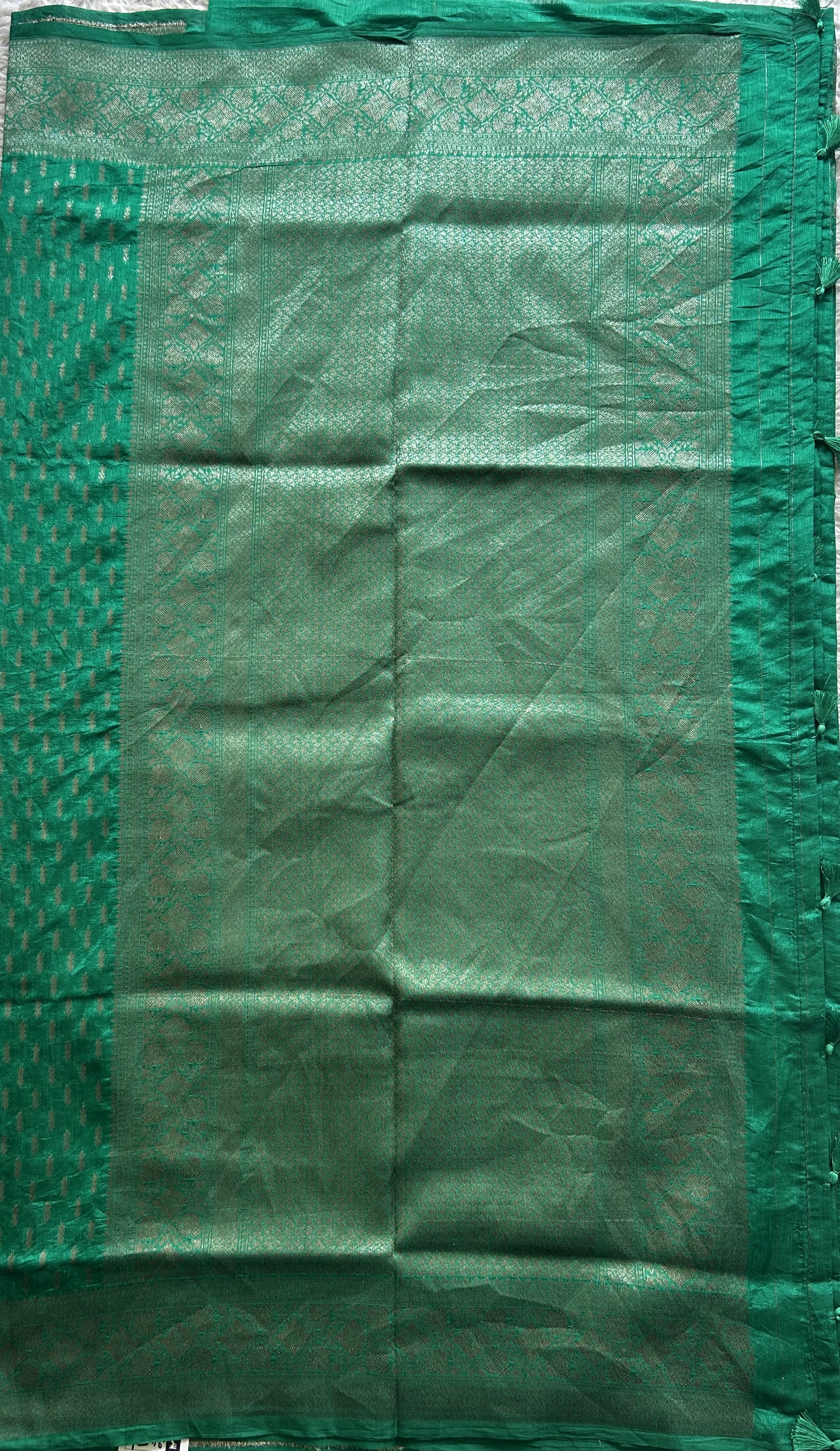 Semi Raw Silk Saree Rama Green Colored Elegantly paired with a Silver Zari Border. - Sampradaya Designer Studio