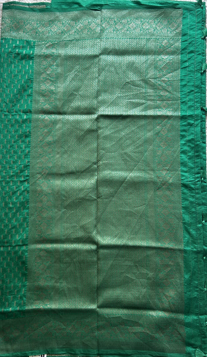 Semi Raw Silk Saree Rama Green Colored Elegantly paired with a Silver Zari Border. - Sampradaya Designer Studio