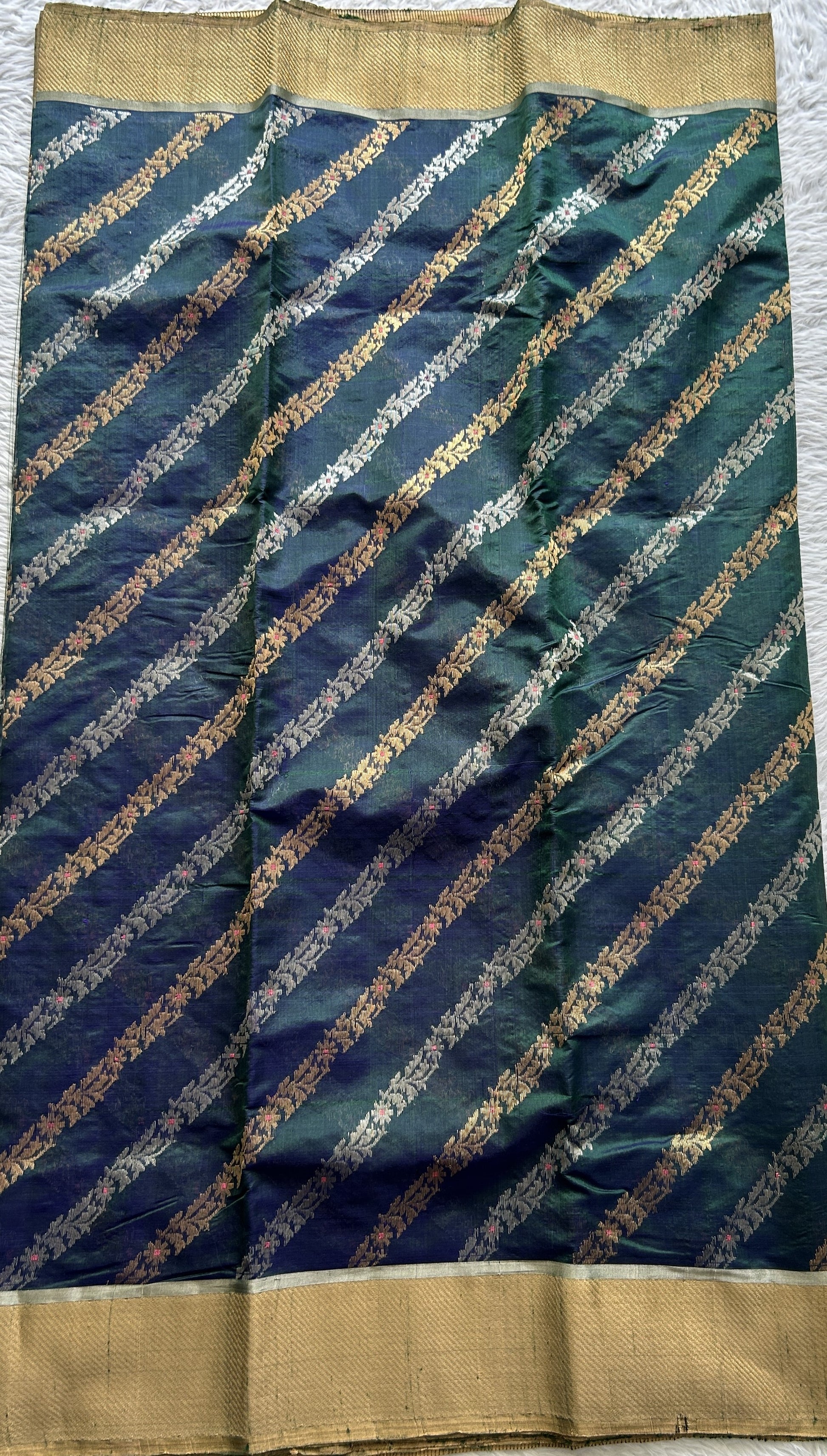 Chanderi Silk Saree Bottle Green Colored Complemented with a Silver Zari Border - Sampradaya Designer Studio