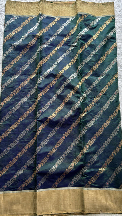Chanderi Silk Saree Bottle Green Colored Complemented with a Silver Zari Border - Sampradaya Designer Studio