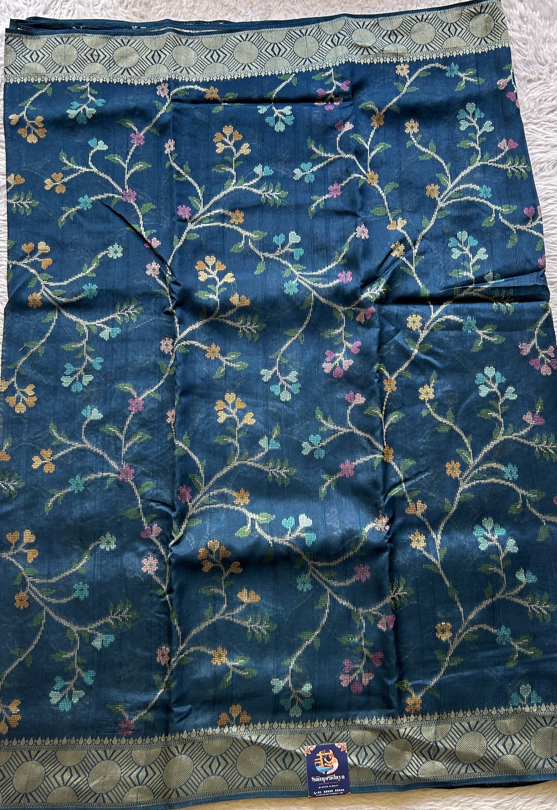 Banarasi Tussar Georgette Allover Saree Peacock Blue Colored Exquisite Zari Border. - Sampradaya Designer Studio