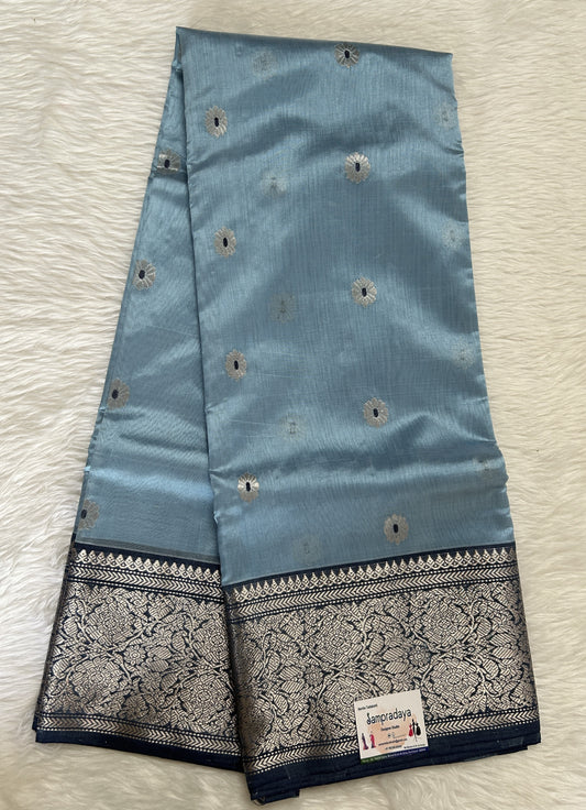 Chanderi Pattu Saree Light Blue colored saree complemented with a Prussian Blue Kanchi border - Sampradaya Designer Studio