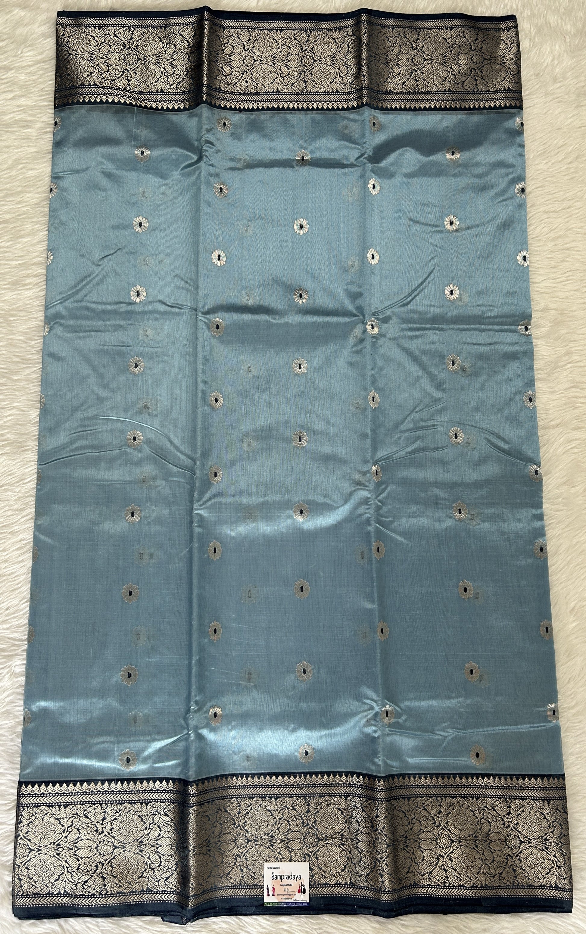 Chanderi Pattu Saree Light Blue colored saree complemented with a Prussian Blue Kanchi border - Sampradaya Designer Studio