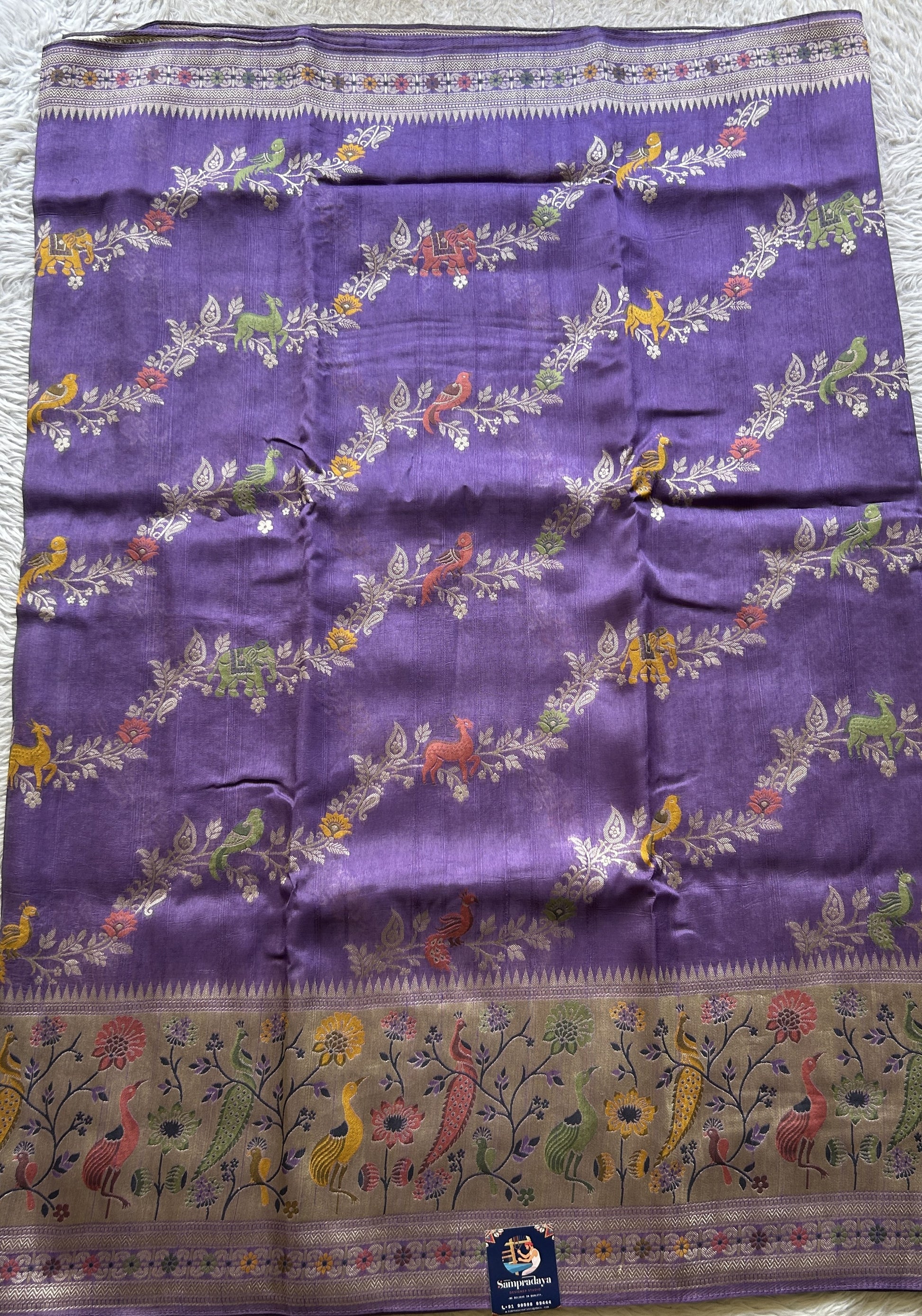 Banarasi Tussar Georgette Allover Saree Lilac Colored Paired with a Zari Border. - Sampradaya Designer Studio