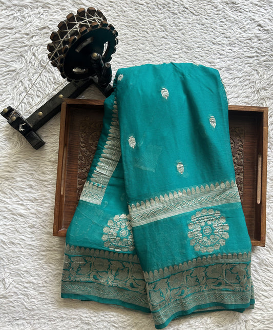 Semi Georgette Saree Sky Blue Colored Elegantly Paired with Silver Zari Border. - Sampradaya Designer Studio